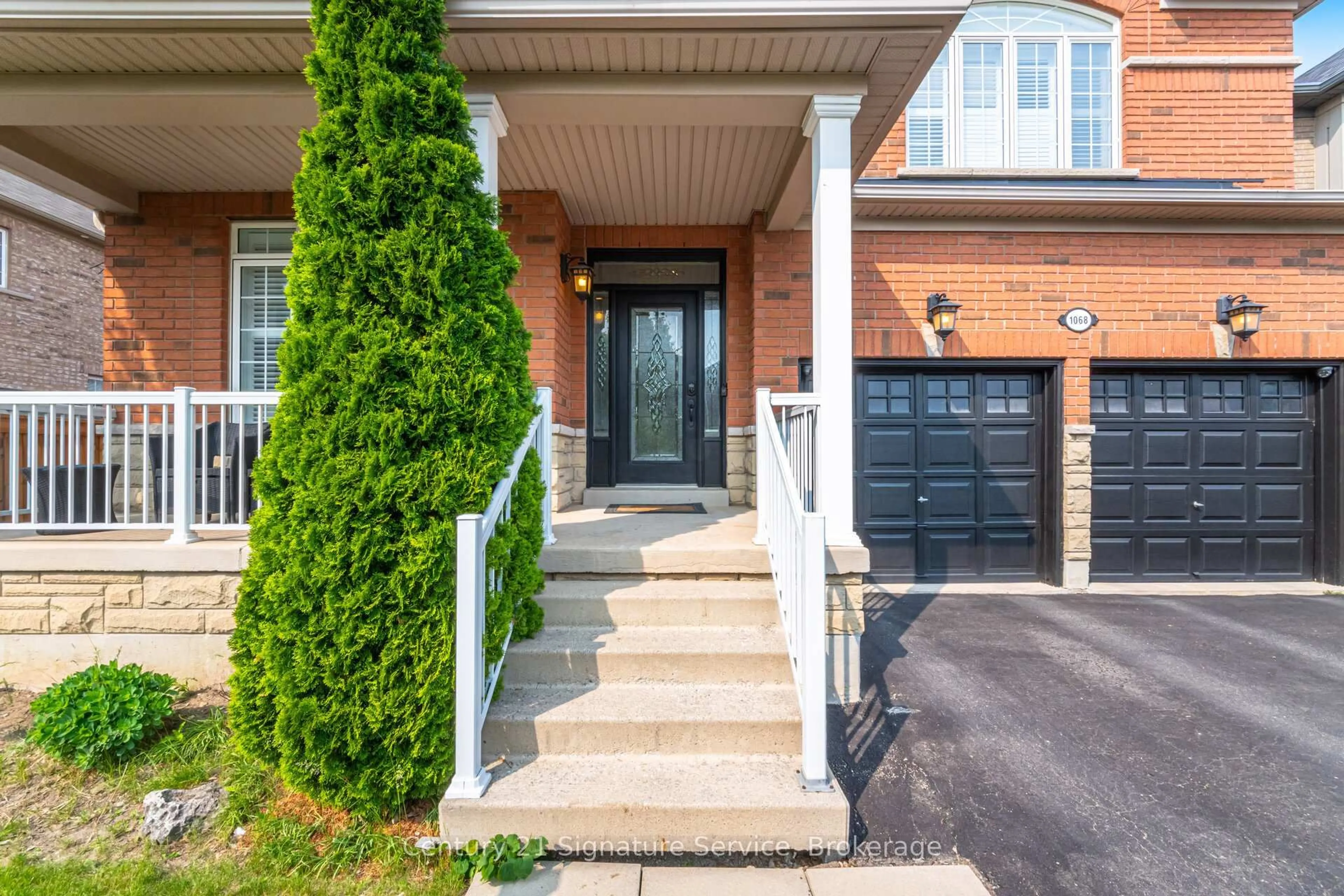 Home with brick exterior material, street for 1068 Hemstreet Cres, Milton Ontario L9T 6S3