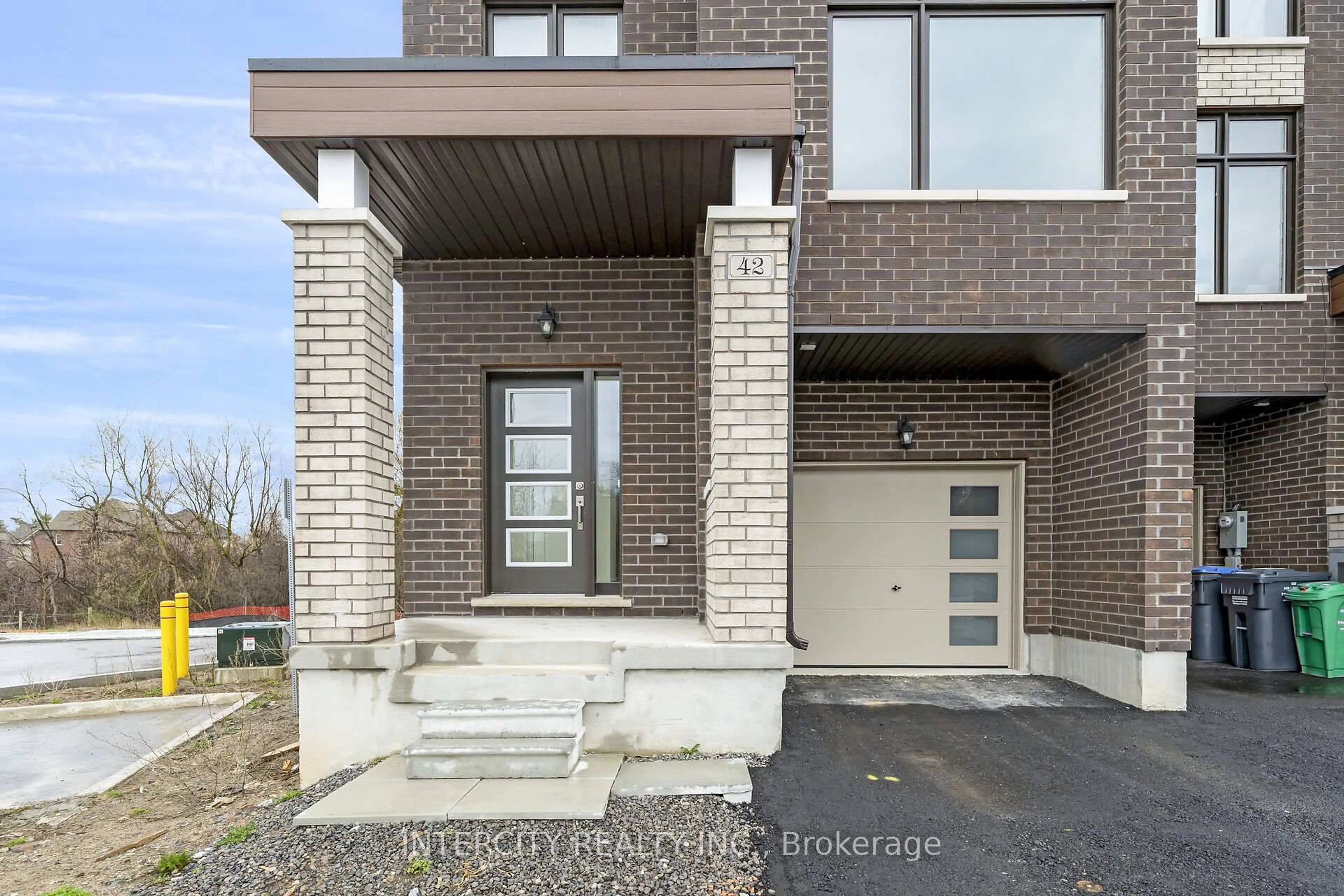 Home with brick exterior material, street for 42 Queenpost Dr #23, Brampton Ontario L6Y 6L2