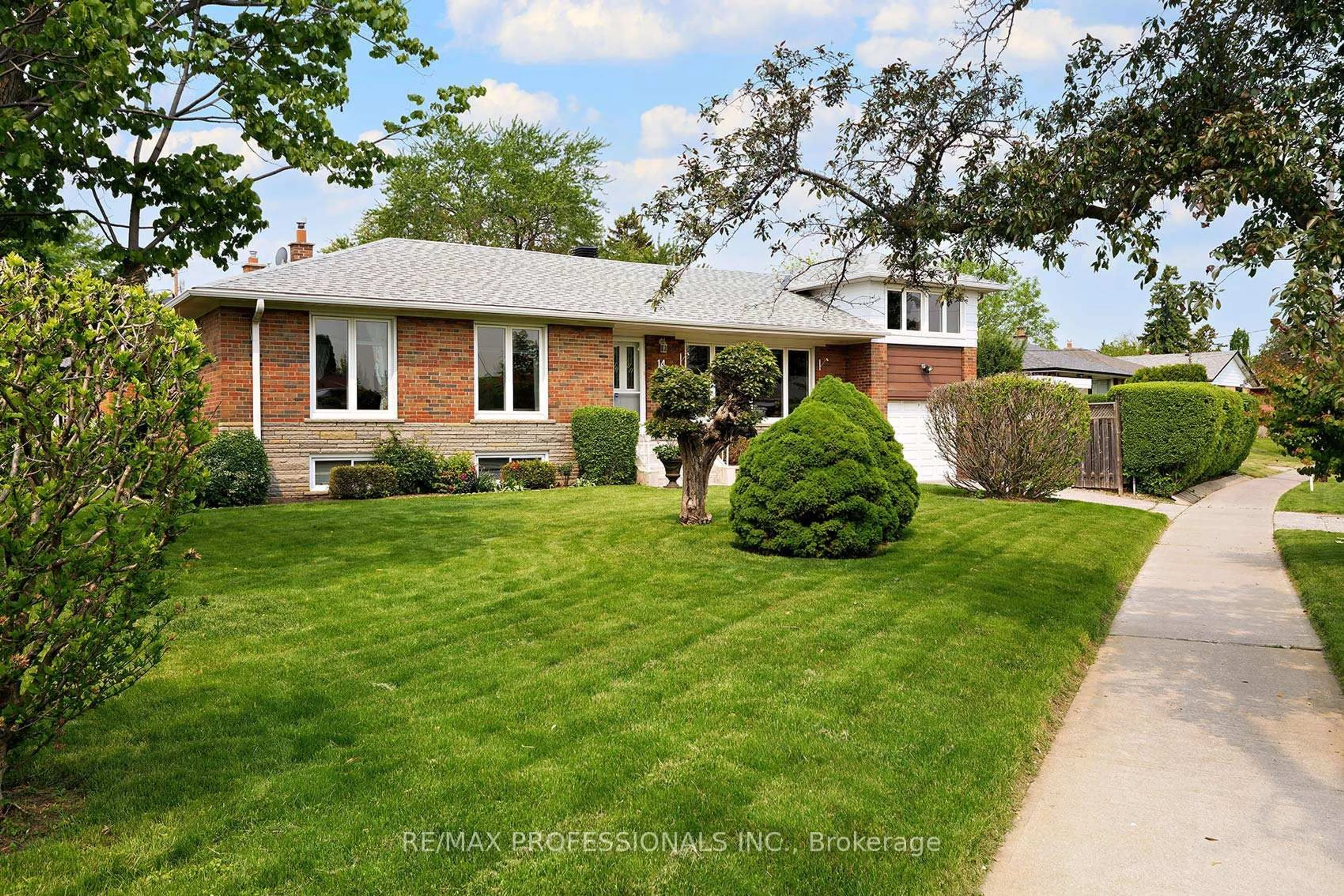 Home with brick exterior material, street for 14 Baskerville Cres, Toronto Ontario M9C 1T8