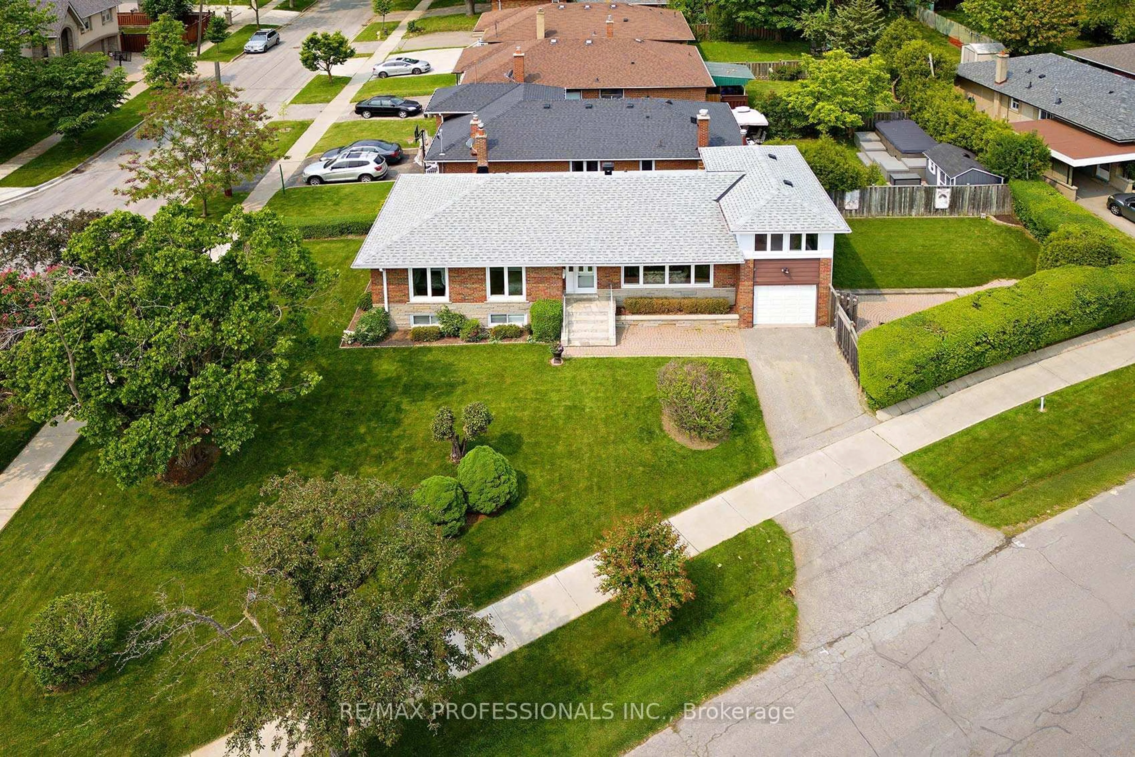 A pic from outside/outdoor area/front of a property/back of a property/a pic from drone, street for 14 Baskerville Cres, Toronto Ontario M9C 1T8