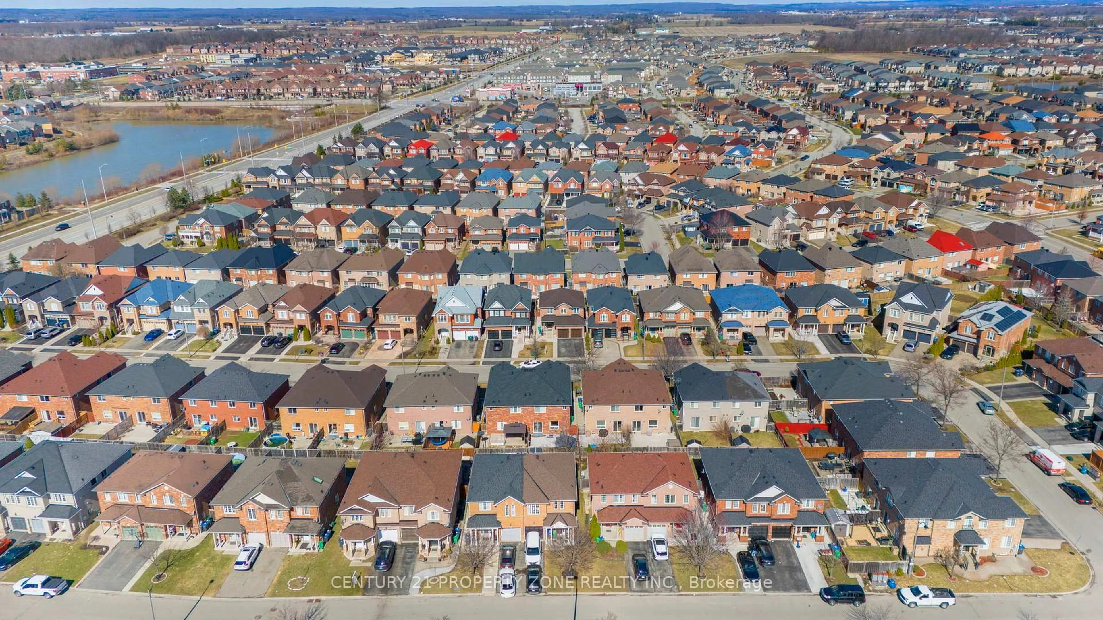 A pic from outside/outdoor area/front of a property/back of a property/a pic from drone, street for 114 Hollingsworth Circ, Brampton Ontario L7A 0J5