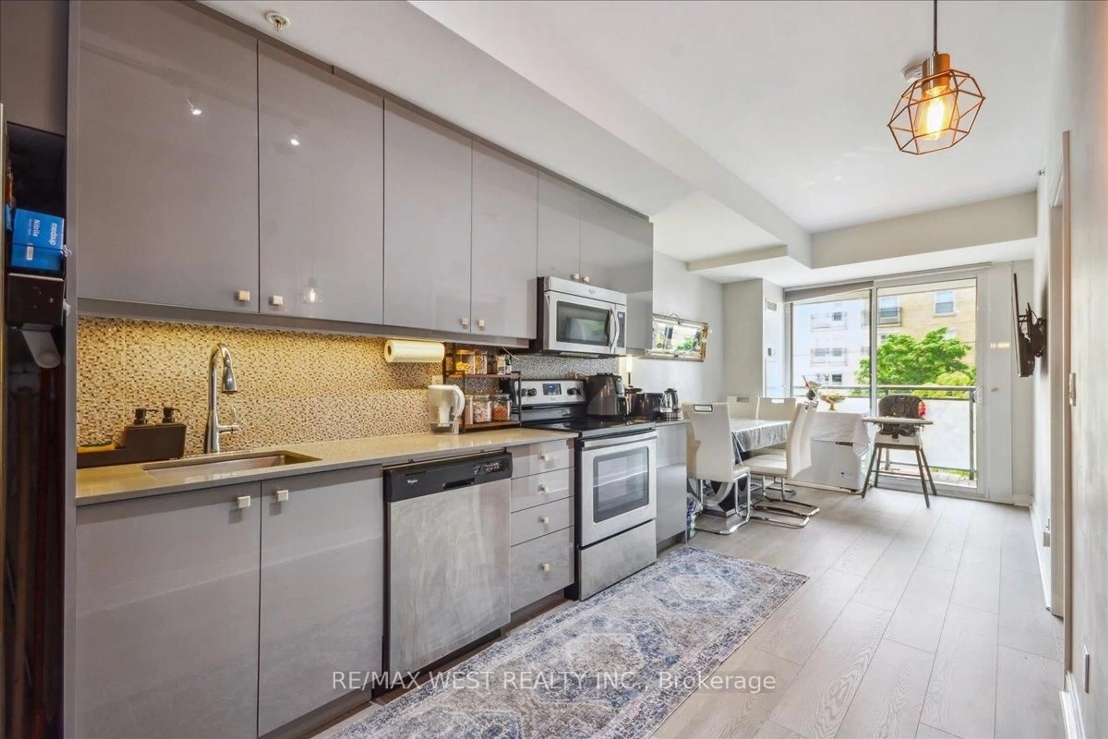 Open concept kitchen, unknown for 760 The Queens Way #212, Toronto Ontario M8Z 0E1