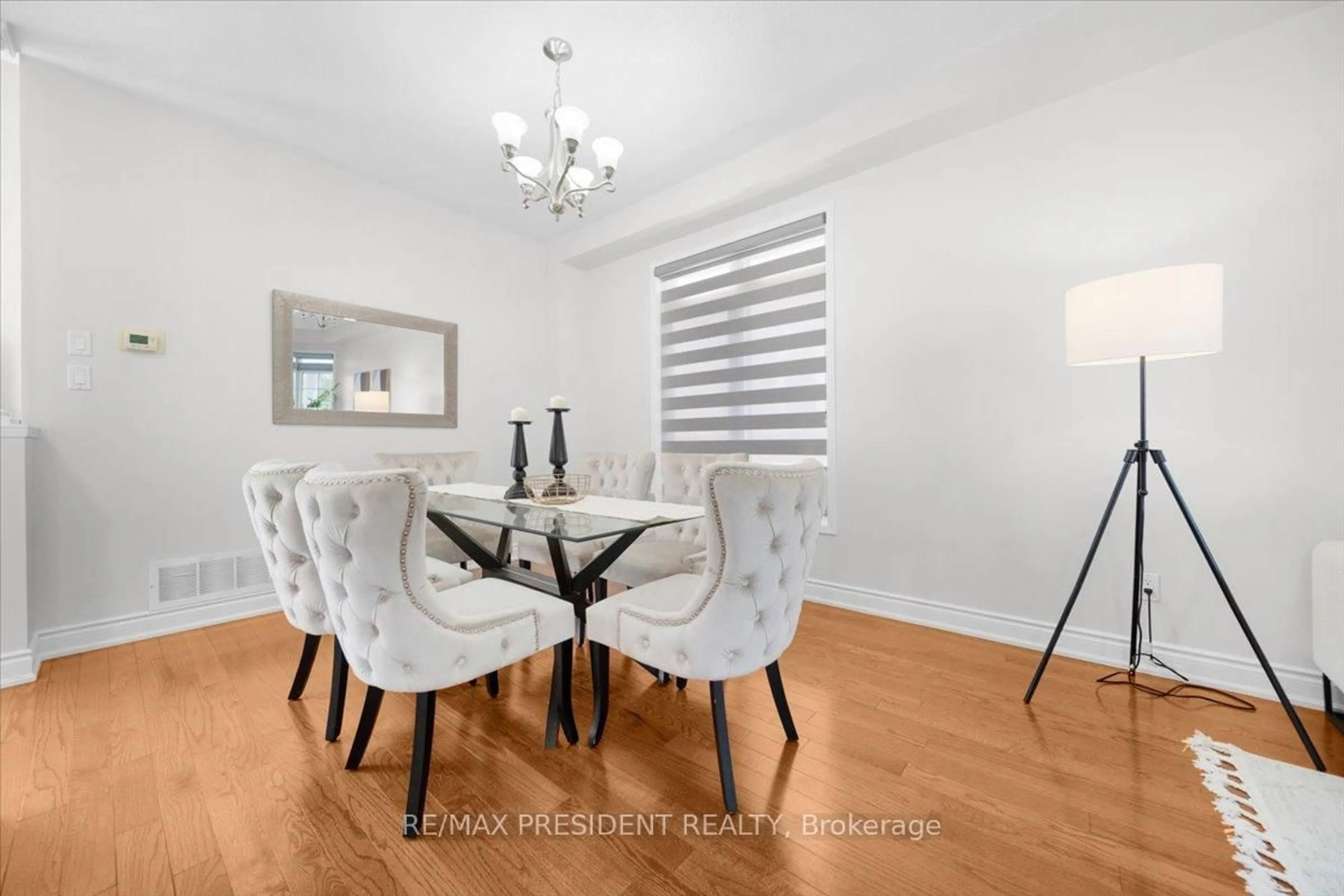 Dining room, wood/laminate floor for 5 Wild Indigo Cres, Brampton Ontario L6R 2K1