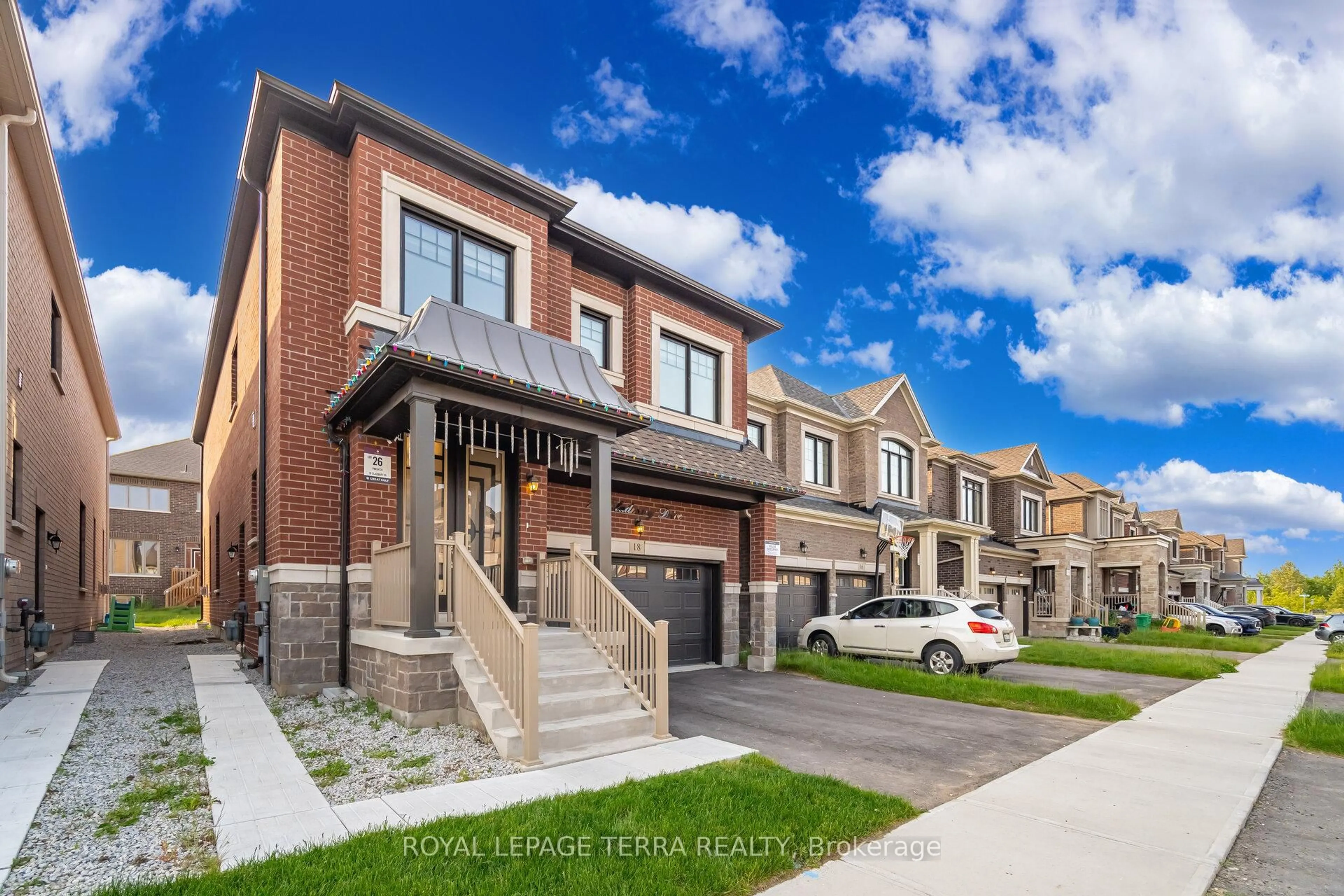 Home with brick exterior material, street for 18 Gladmary Dr, Brampton Ontario L6Y 0E4