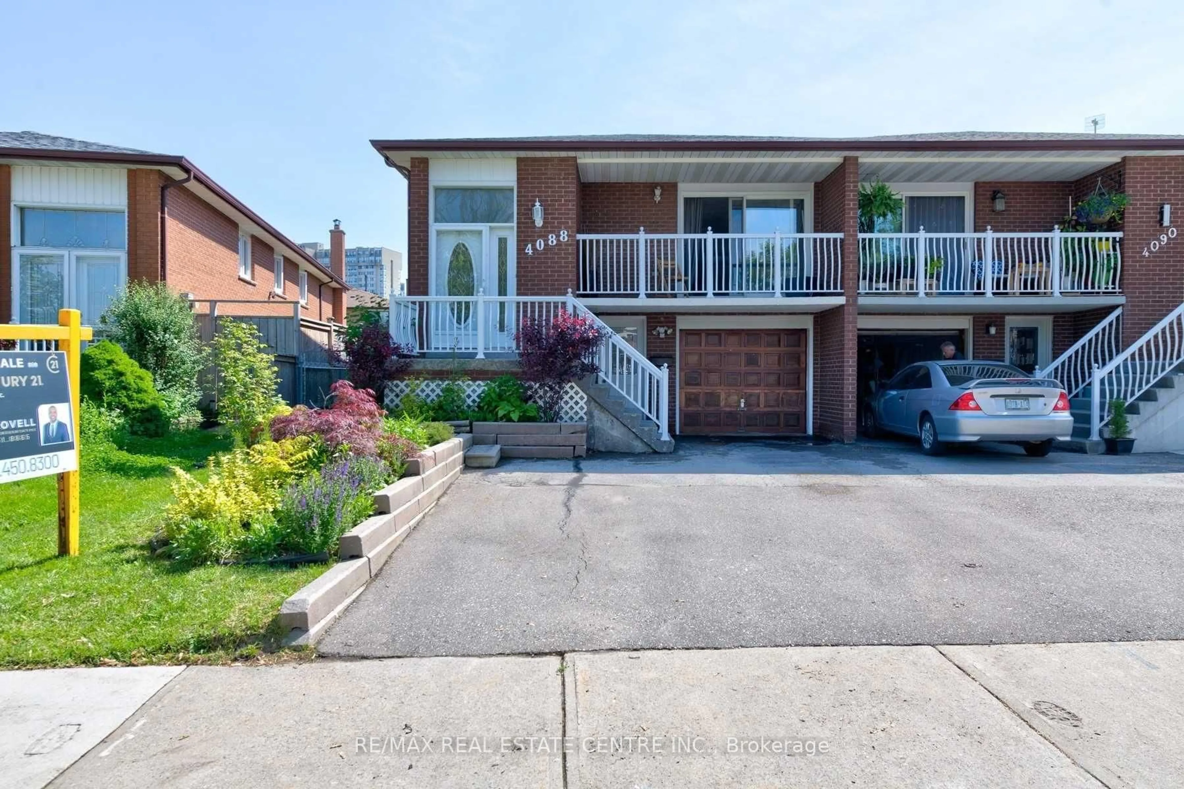 Home with brick exterior material, street for 4088 Woodington Dr, Mississauga Ontario L4Z 1K3