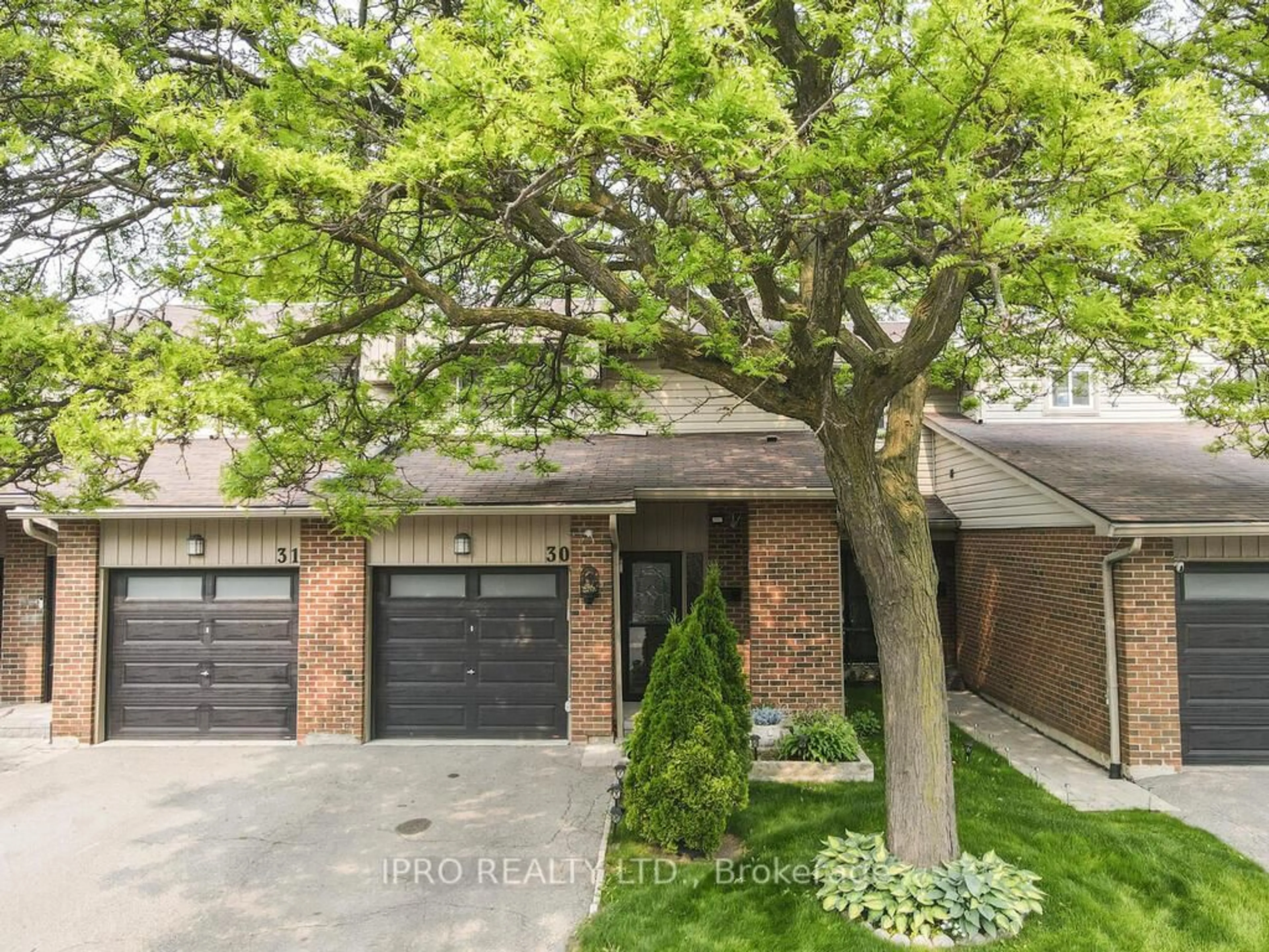 Home with brick exterior material, street for 485 Meadows Blvd #30, Mississauga Ontario L4Z 1H1