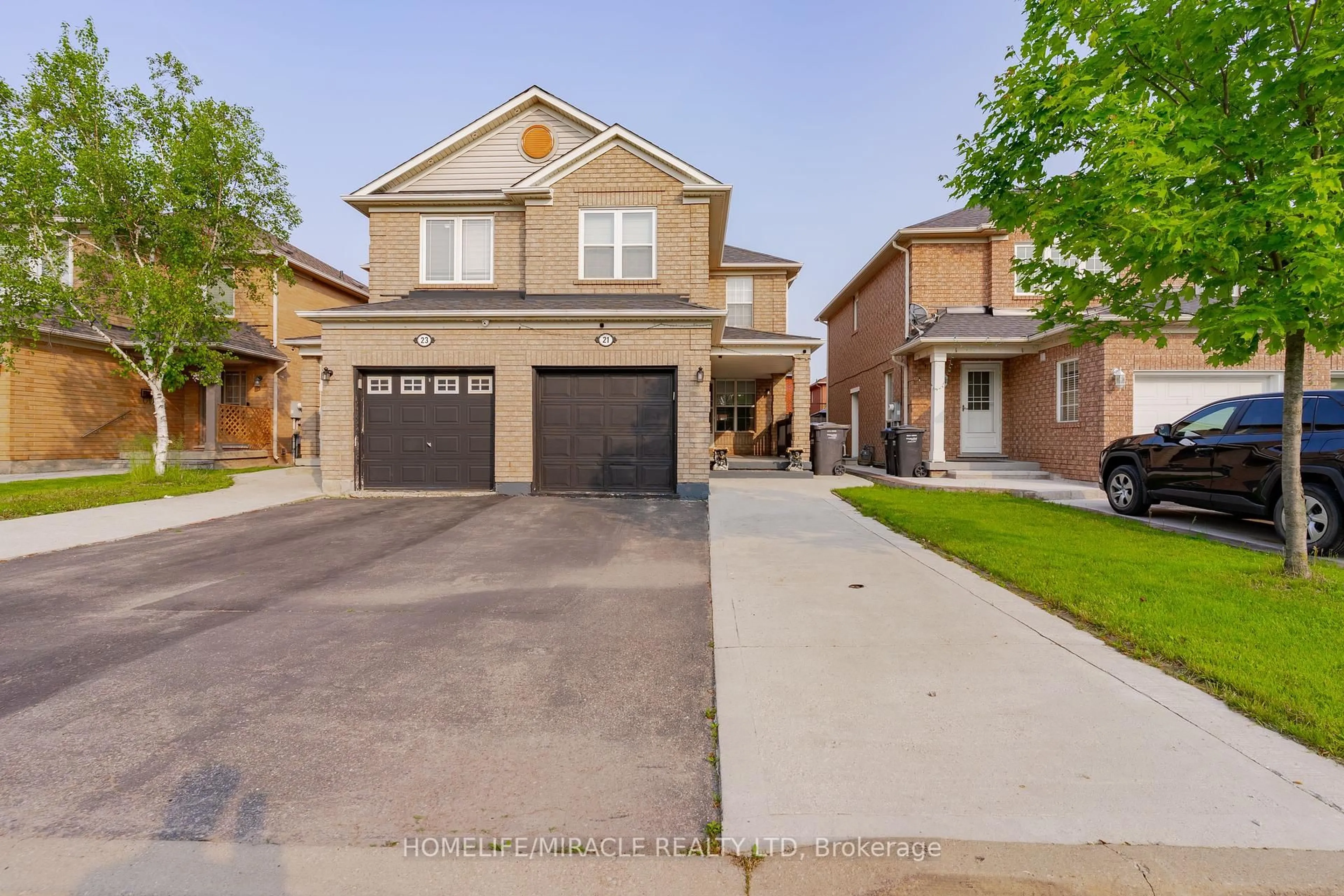 Home with brick exterior material, street for 21 Secord Cres, Brampton Ontario L6X 4Z3