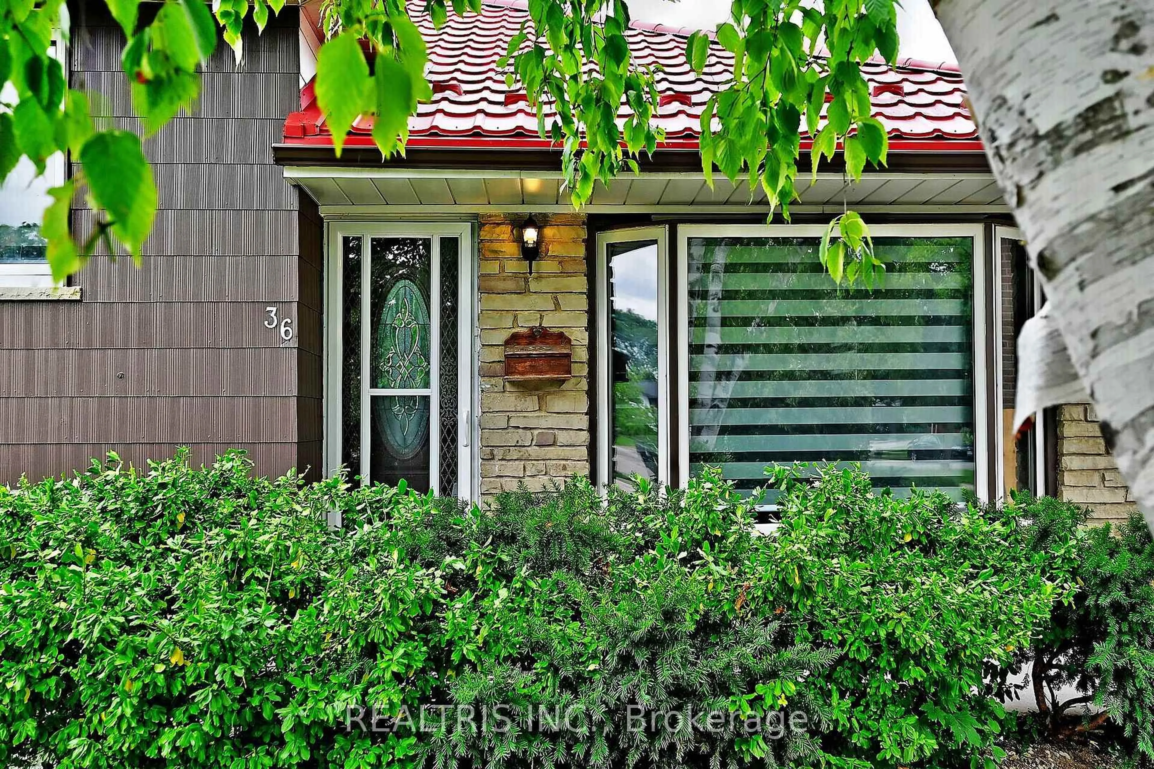 Home with brick exterior material, street for 36 Tealham Dr, Toronto Ontario M9V 3T6
