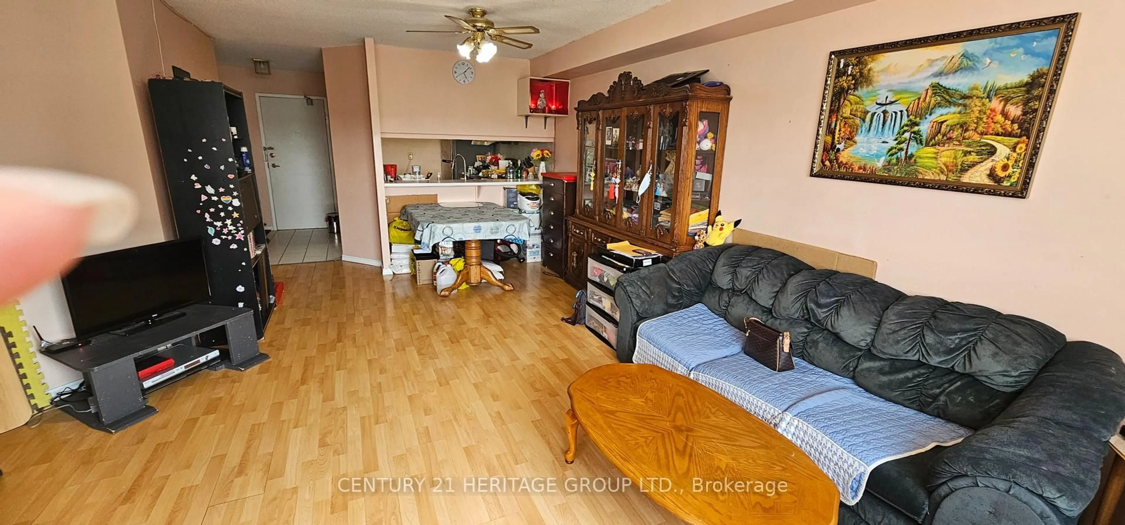 Living room with furniture, wood/laminate floor for 236 Albion Rd #807, Toronto Ontario M9W 6A6