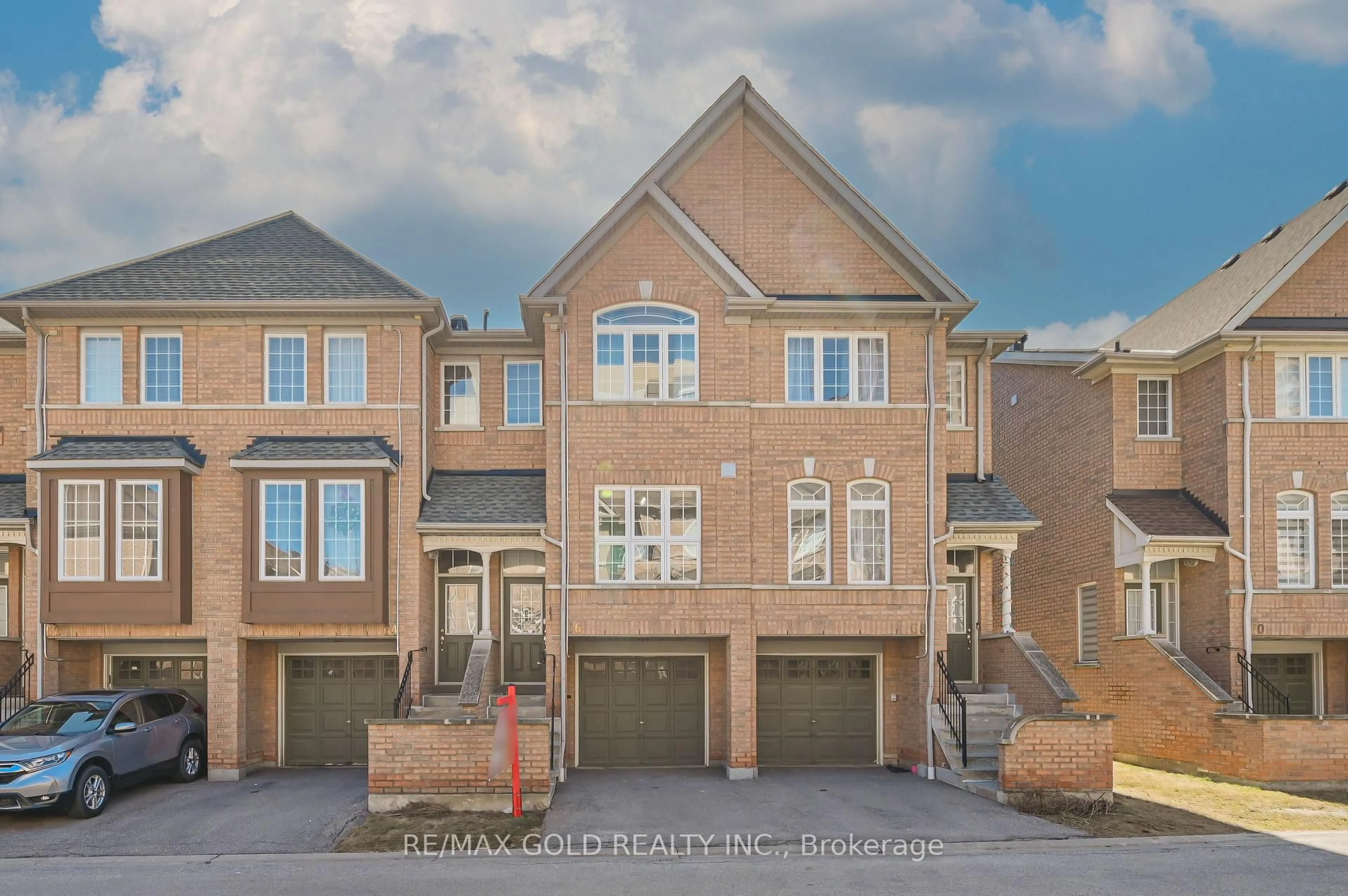 Home with brick exterior material, street for 50 Strathaven Dr #66, Mississauga Ontario L5R 4E7