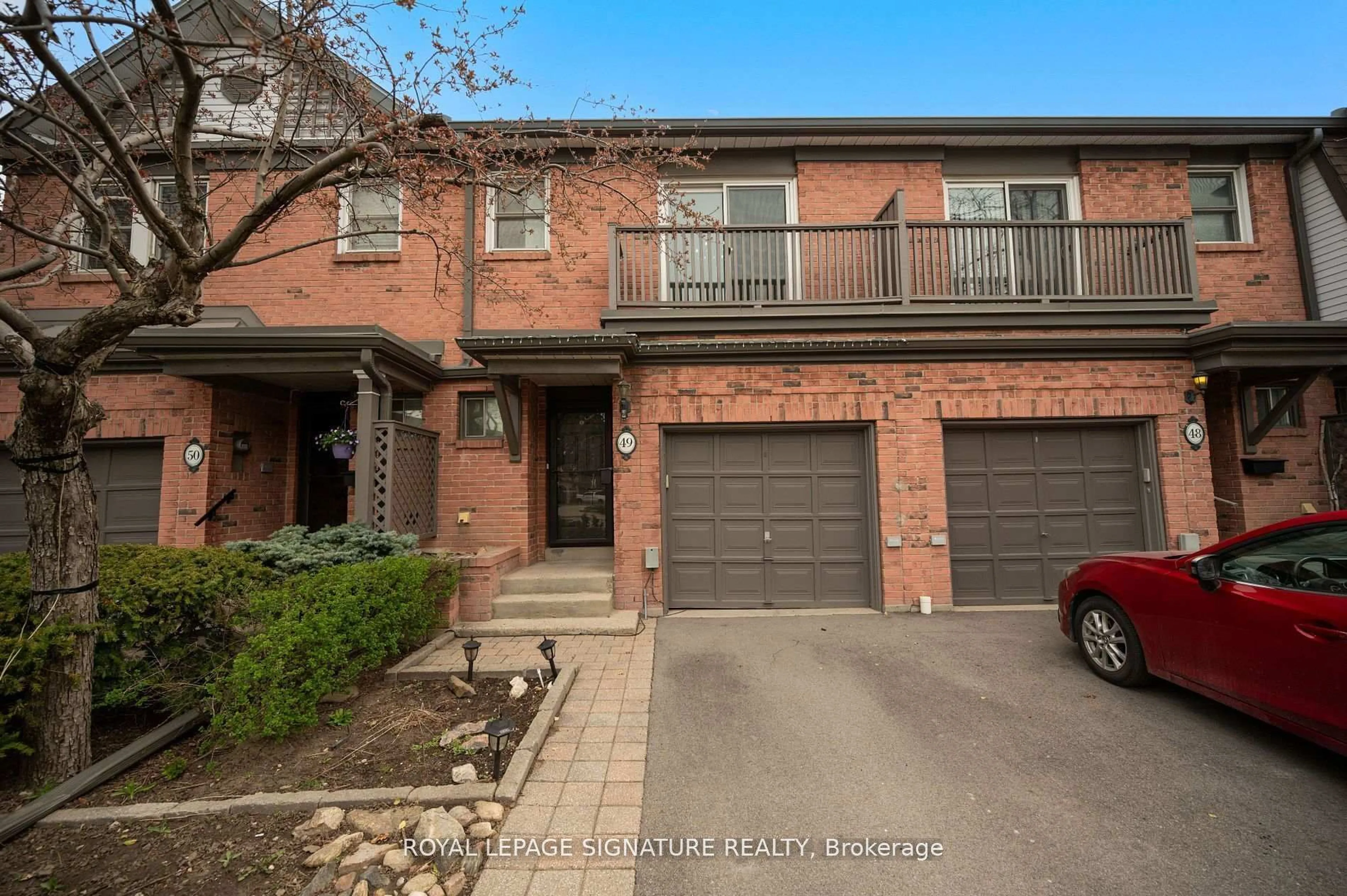 Home with brick exterior material, street for 385 The East Mall #49, Toronto Ontario M9B 6J4