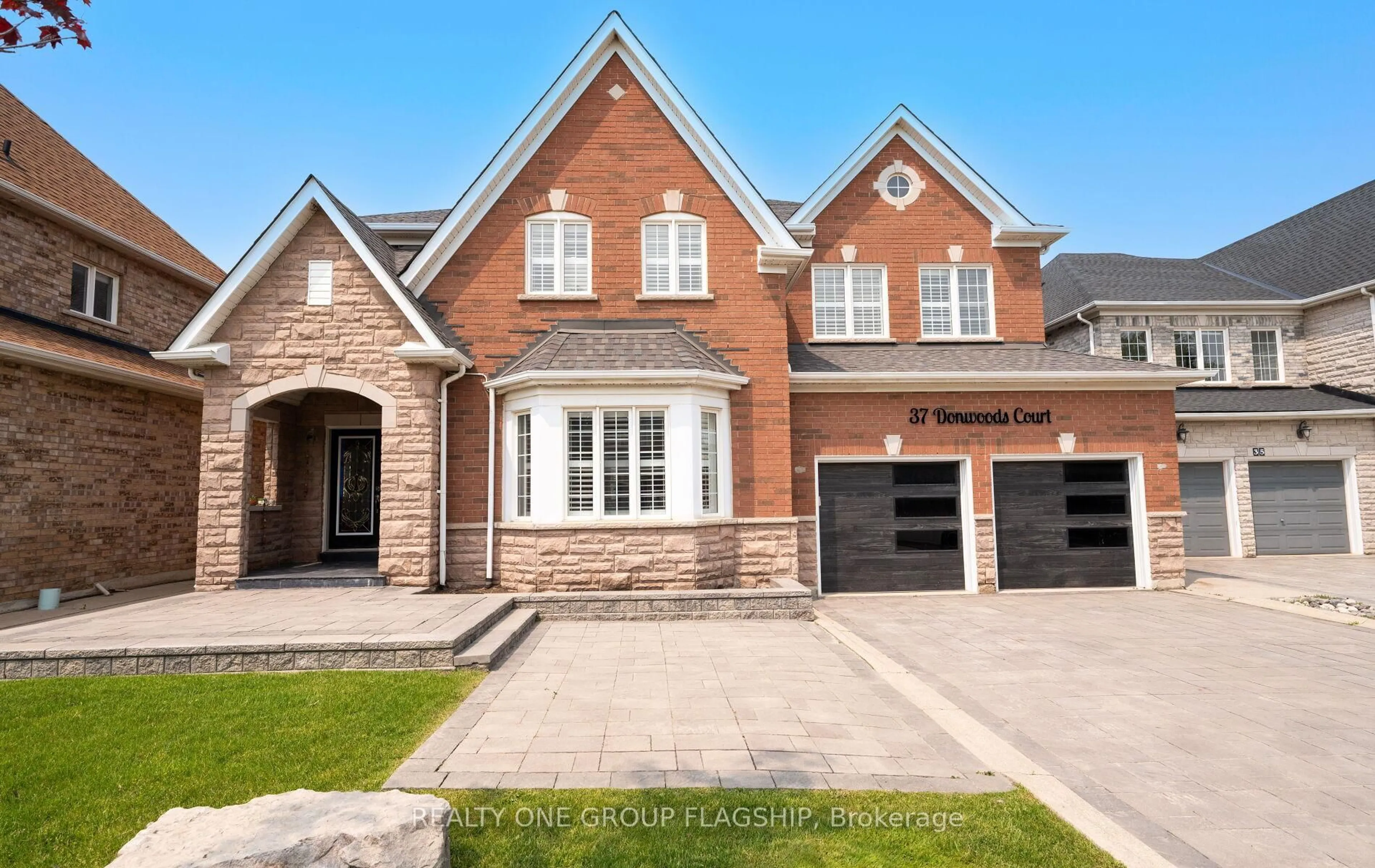 Home with brick exterior material, street for 37 Donwoods Crt, Brampton Ontario L6P 1T6