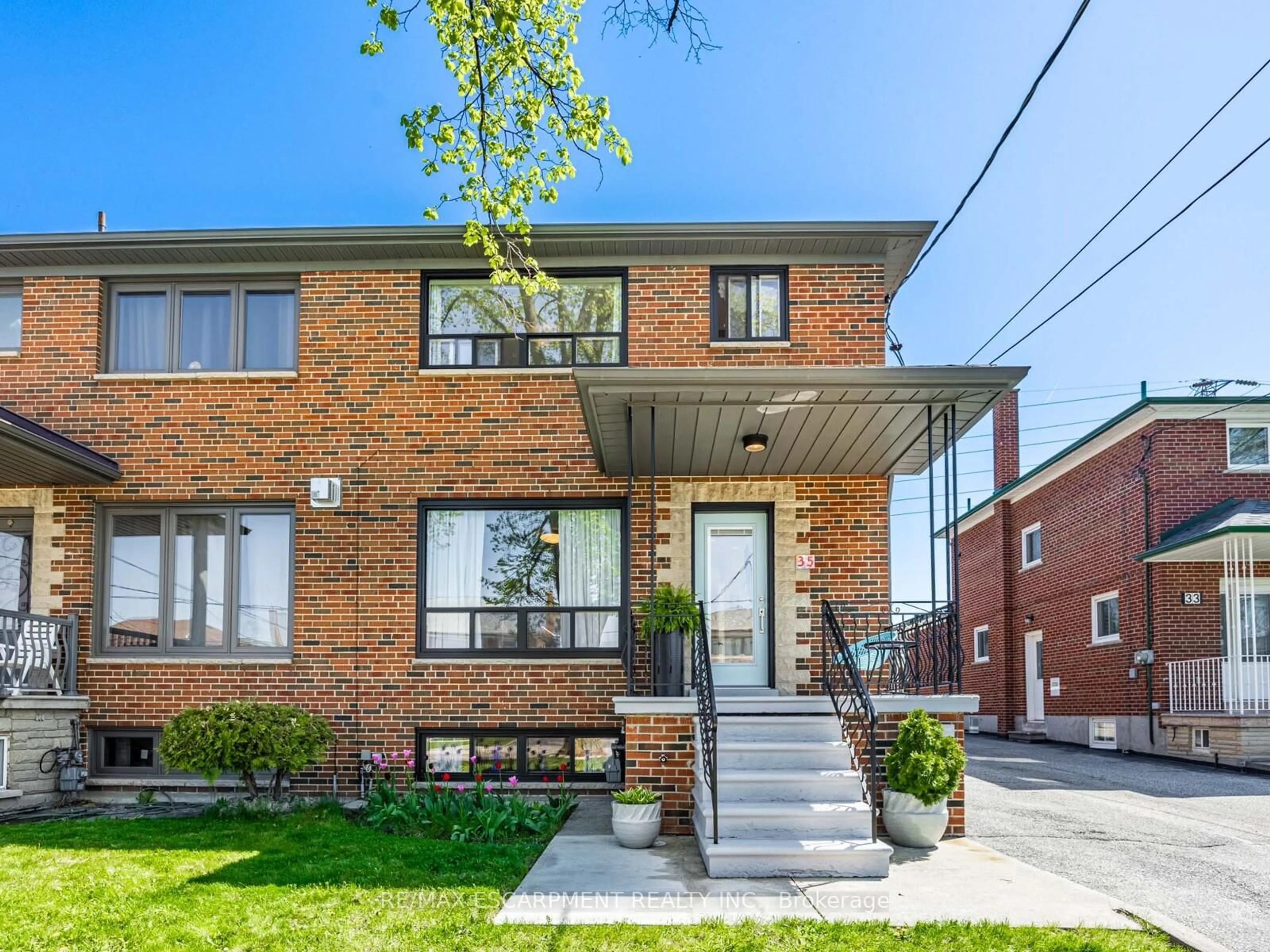 Home with brick exterior material, street for 35 Woodenhill Crt, Toronto Ontario M6M 1K6