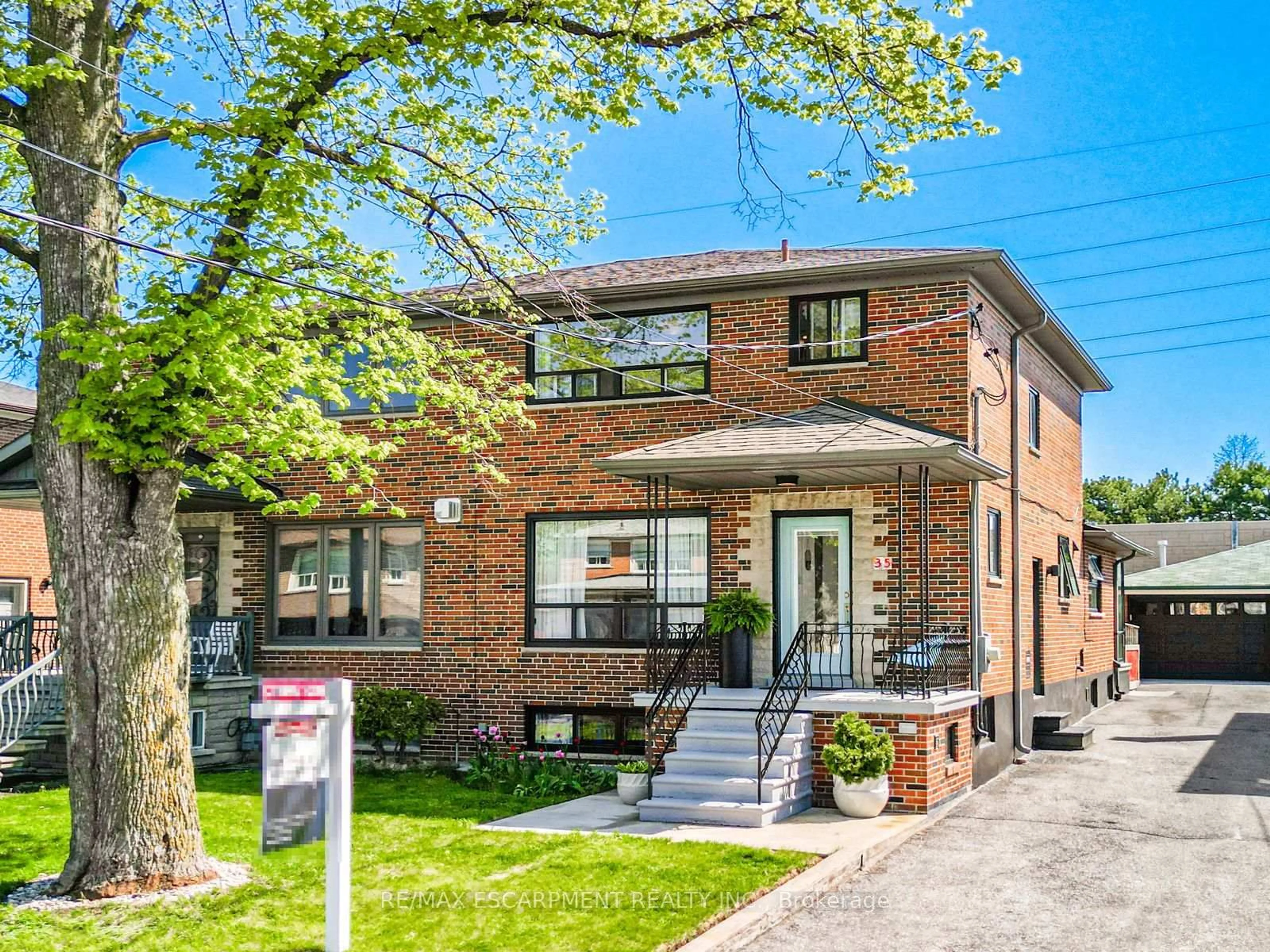 Home with brick exterior material, street for 35 Woodenhill Crt, Toronto Ontario M6M 1K6