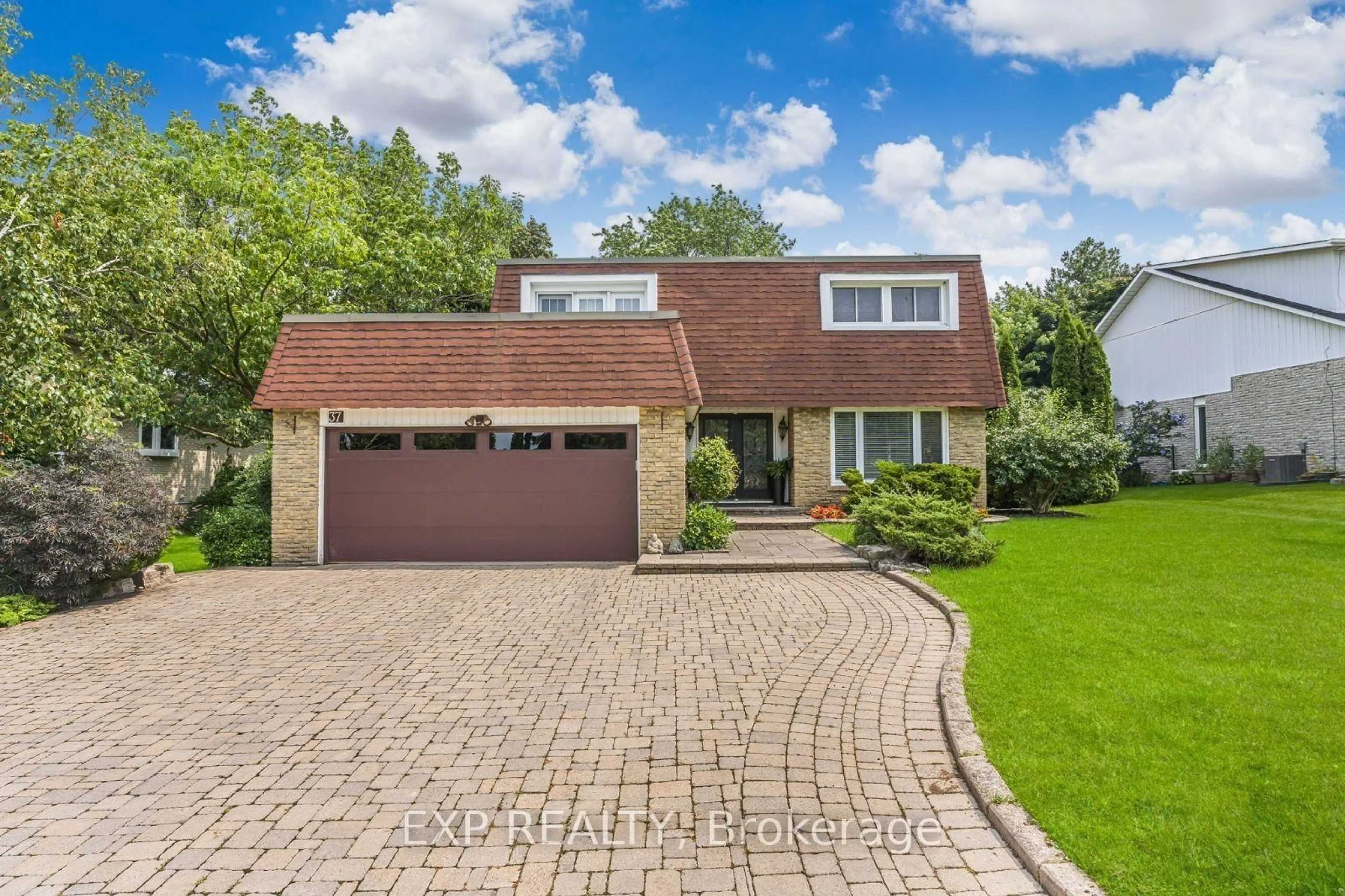Home with brick exterior material, street for 37 Kenninghall Blvd, Mississauga Ontario L5N 1J5