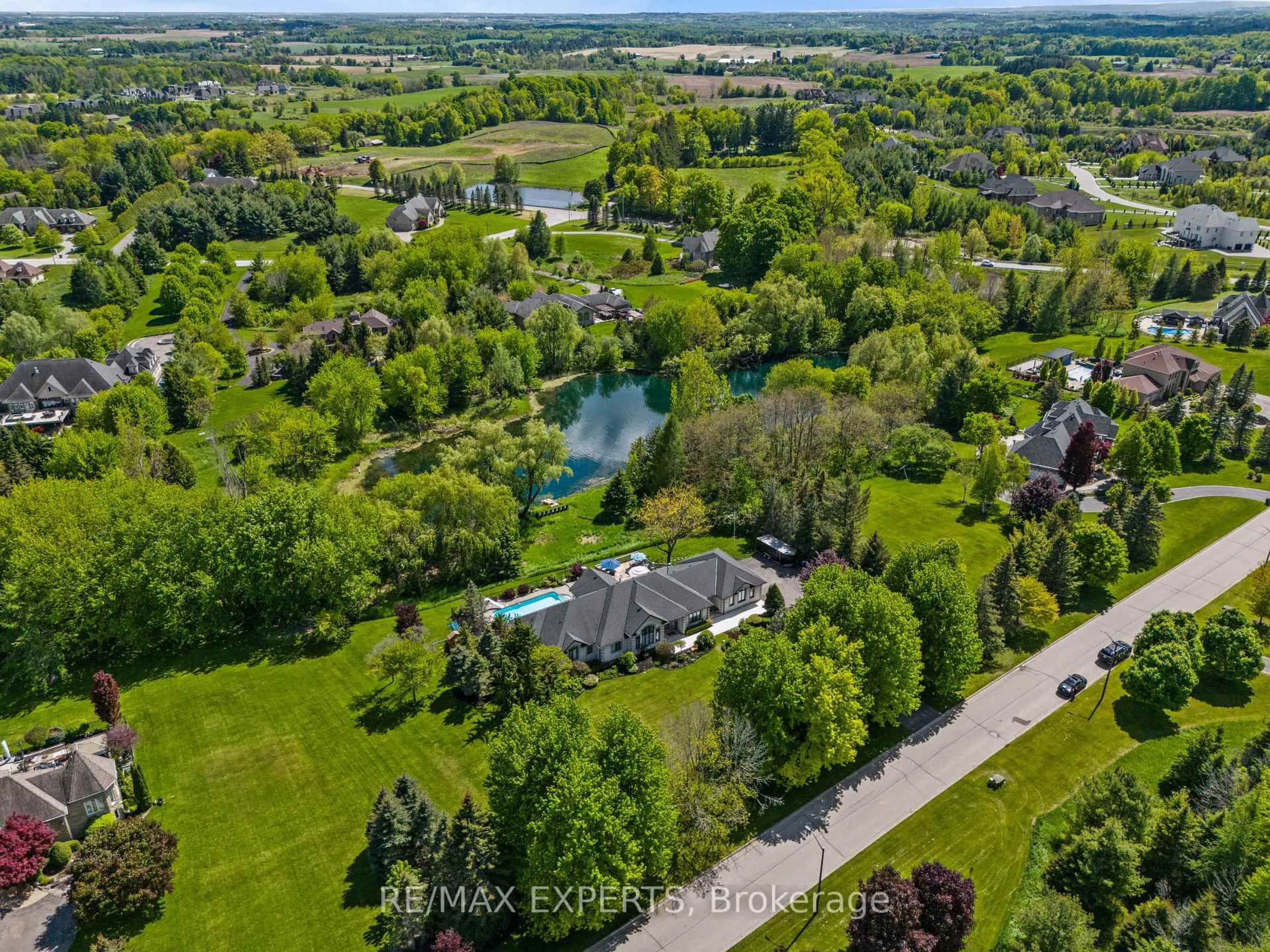 A pic from outside/outdoor area/front of a property/back of a property/a pic from drone, water/lake/river/ocean view for 7 Bruno Ridge Dr, Caledon Ontario L7E 0B7