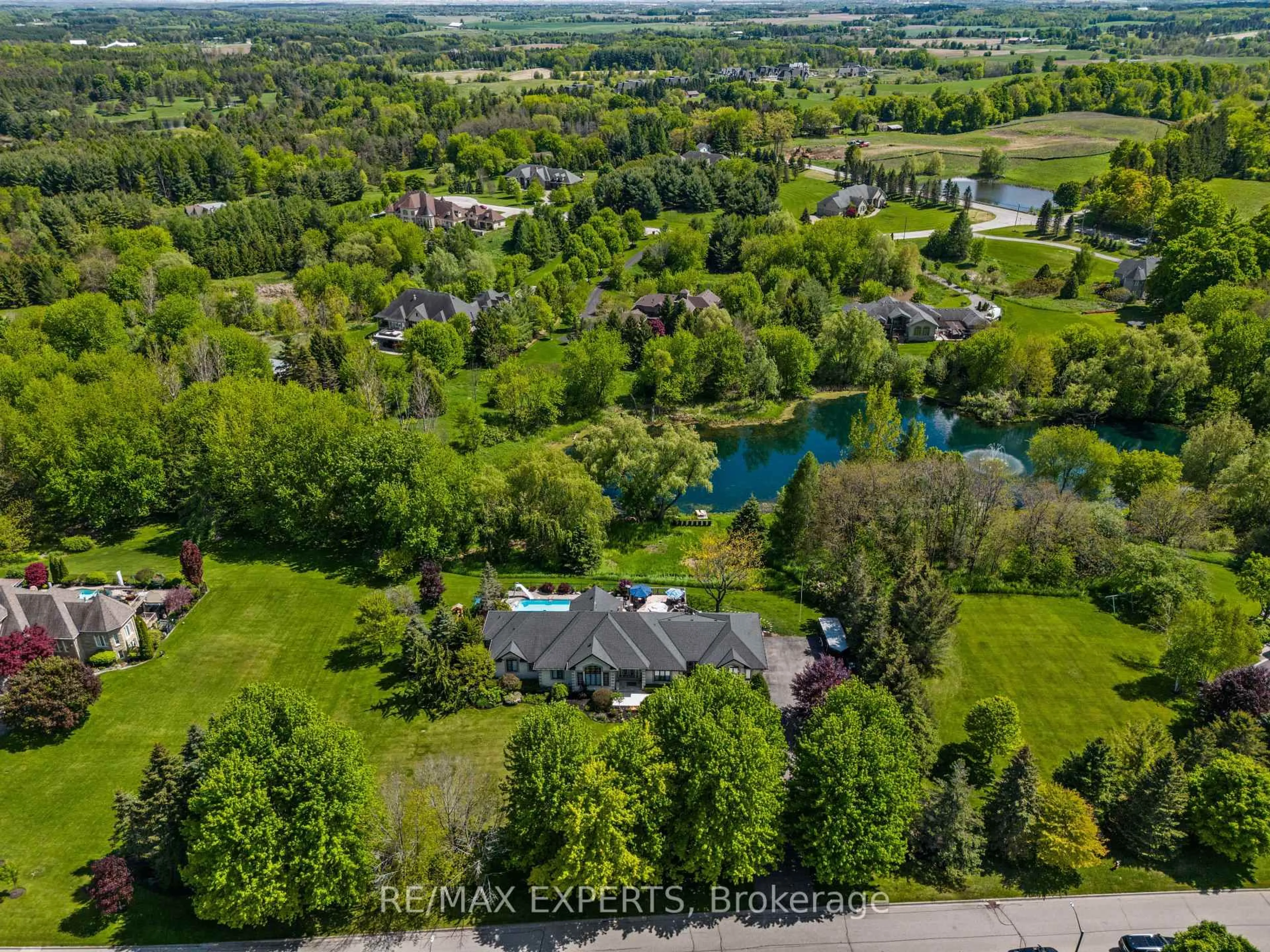 A pic from outside/outdoor area/front of a property/back of a property/a pic from drone, water/lake/river/ocean view for 7 Bruno Ridge Dr, Caledon Ontario L7E 0B7