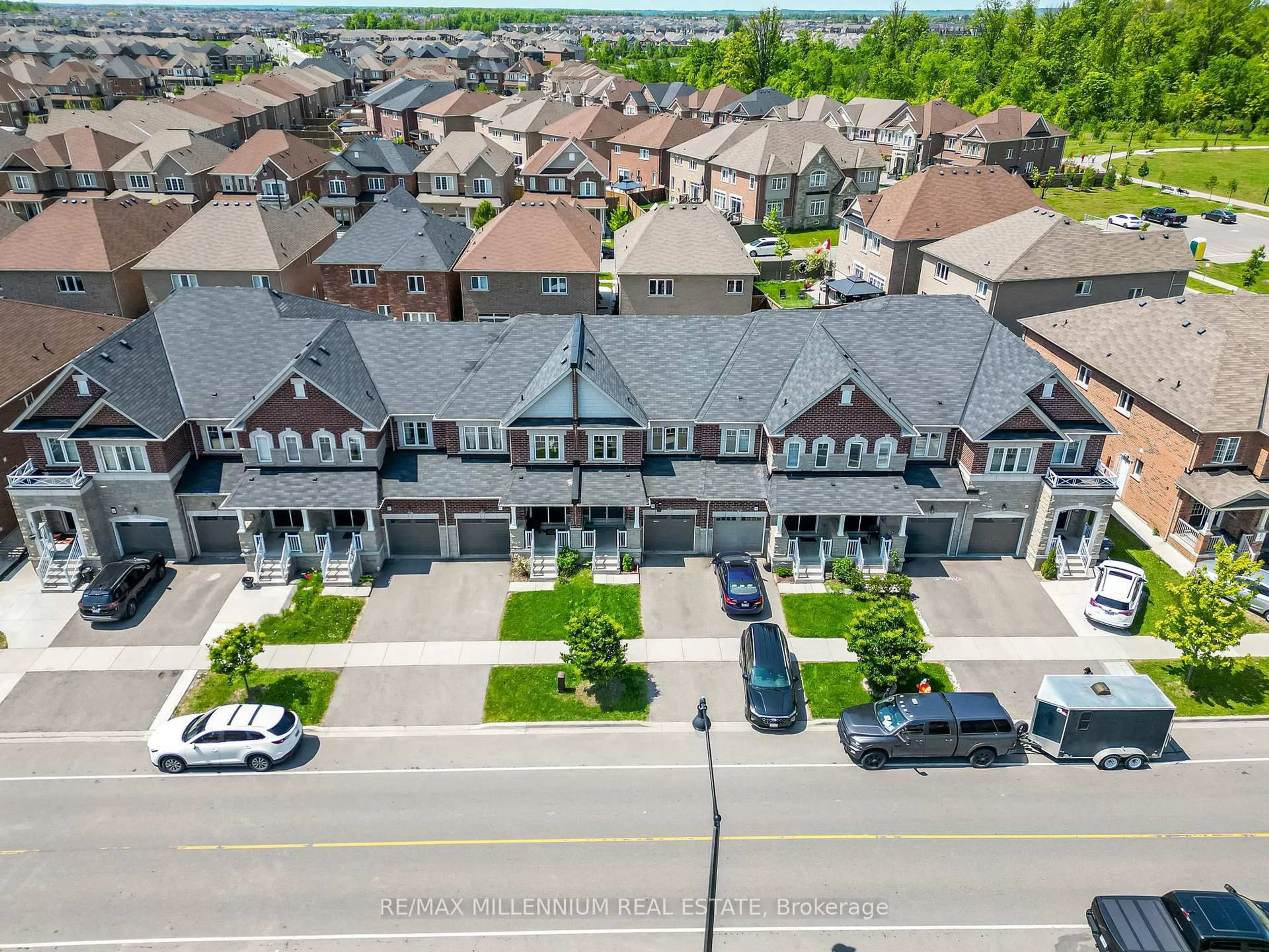 A pic from outside/outdoor area/front of a property/back of a property/a pic from drone, street for 494 Queen Mary Dr, Brampton Ontario L7A 4N3