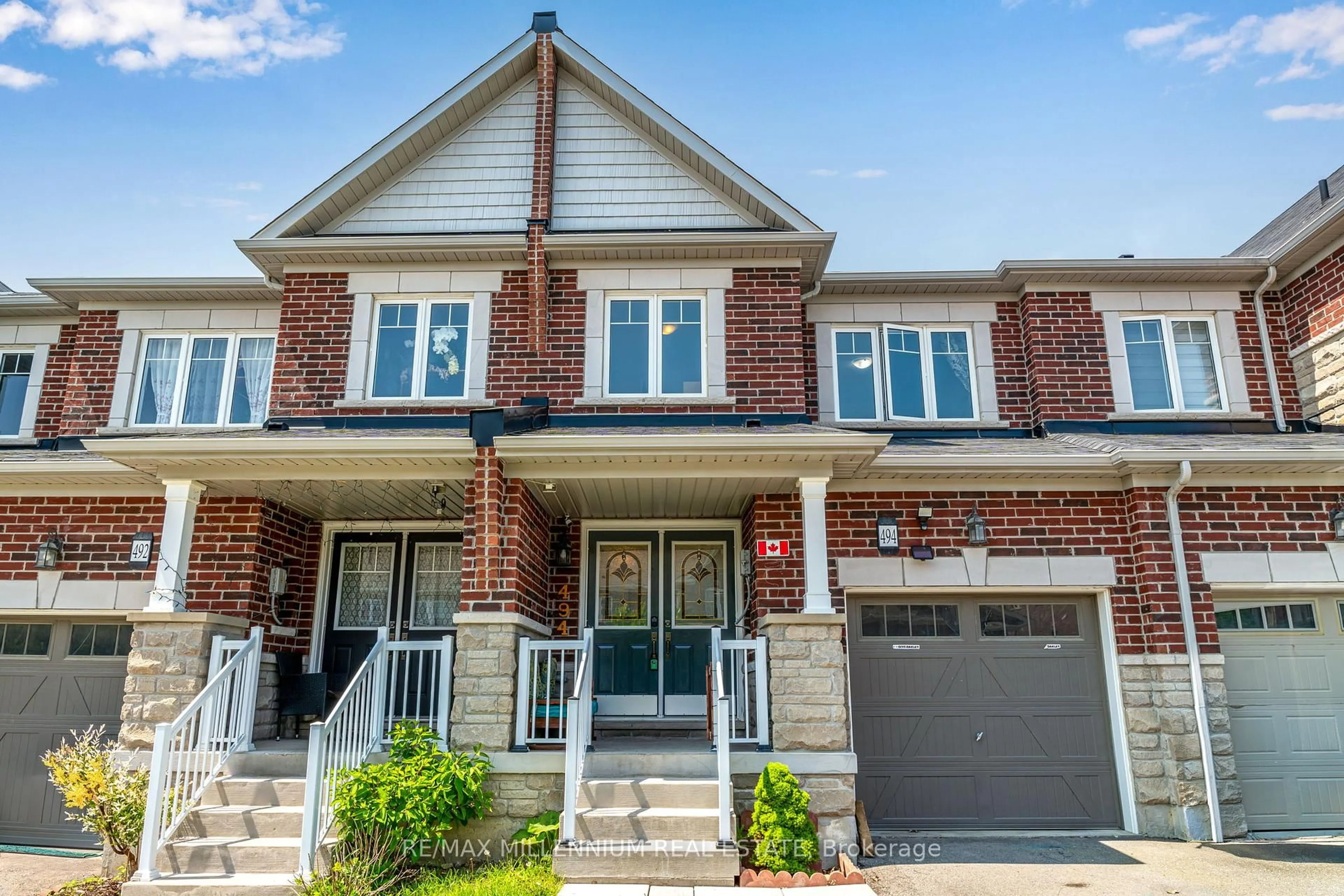 Home with brick exterior material, street for 494 Queen Mary Dr, Brampton Ontario L7A 4N3