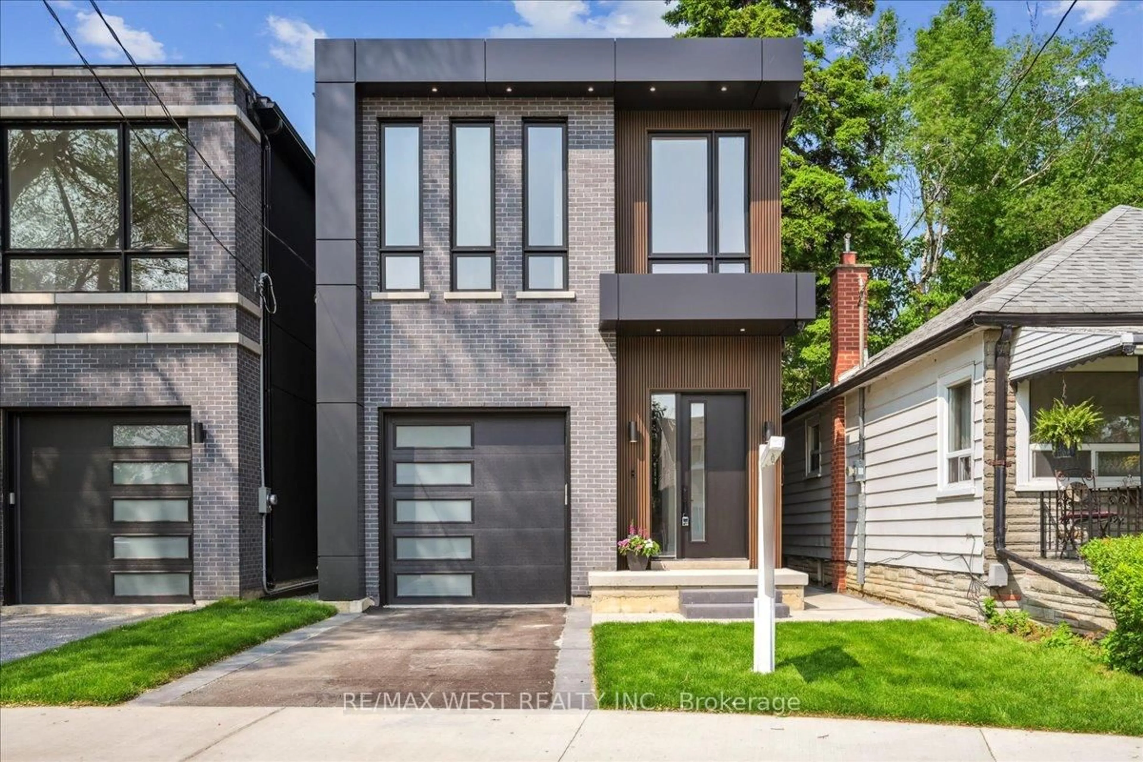 Home with brick exterior material, street for 12B Foch Ave, Toronto Ontario M8W 3X1