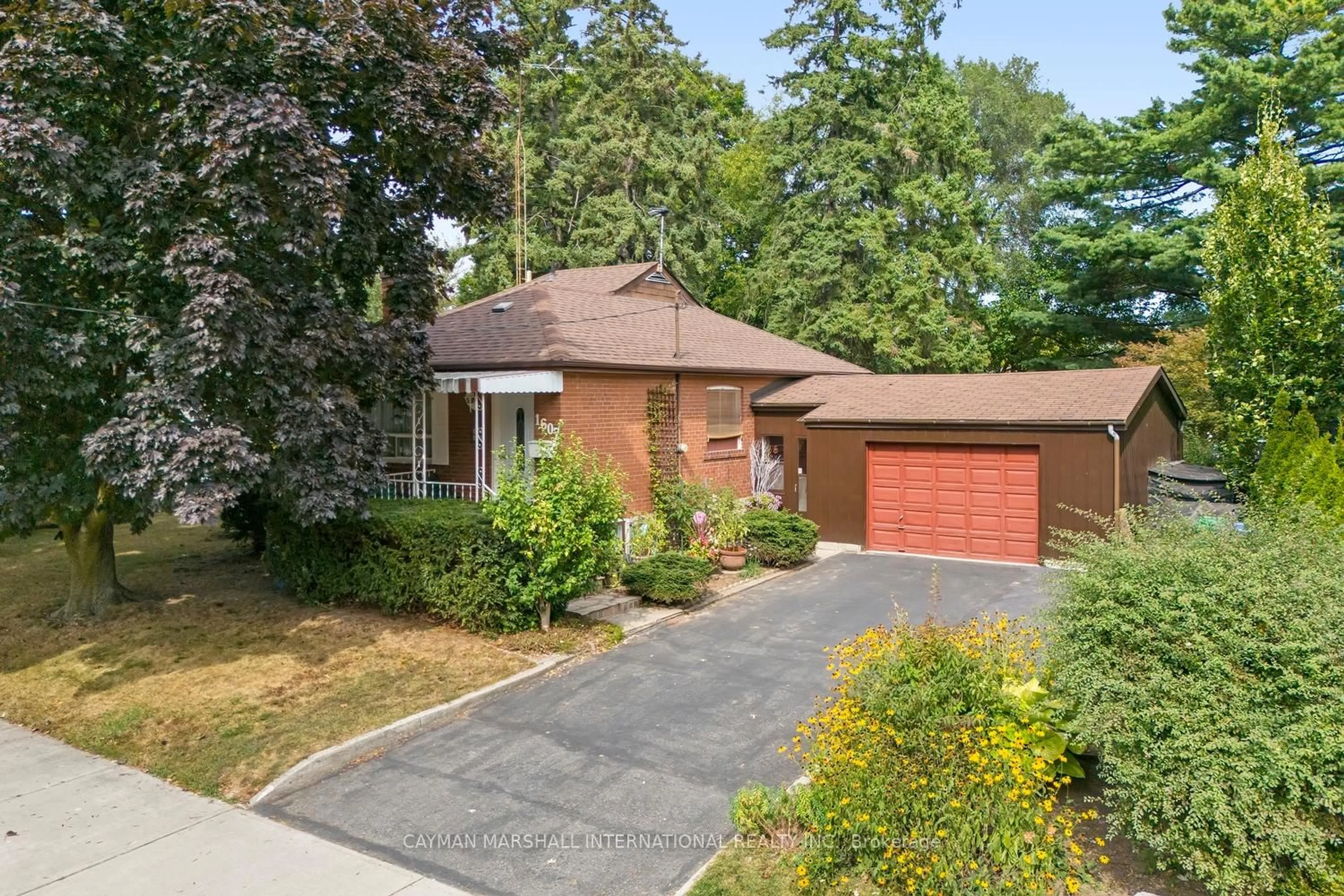 Home with brick exterior material, street for 1607 Kenmuir Ave, Mississauga Ontario L5G 4B6