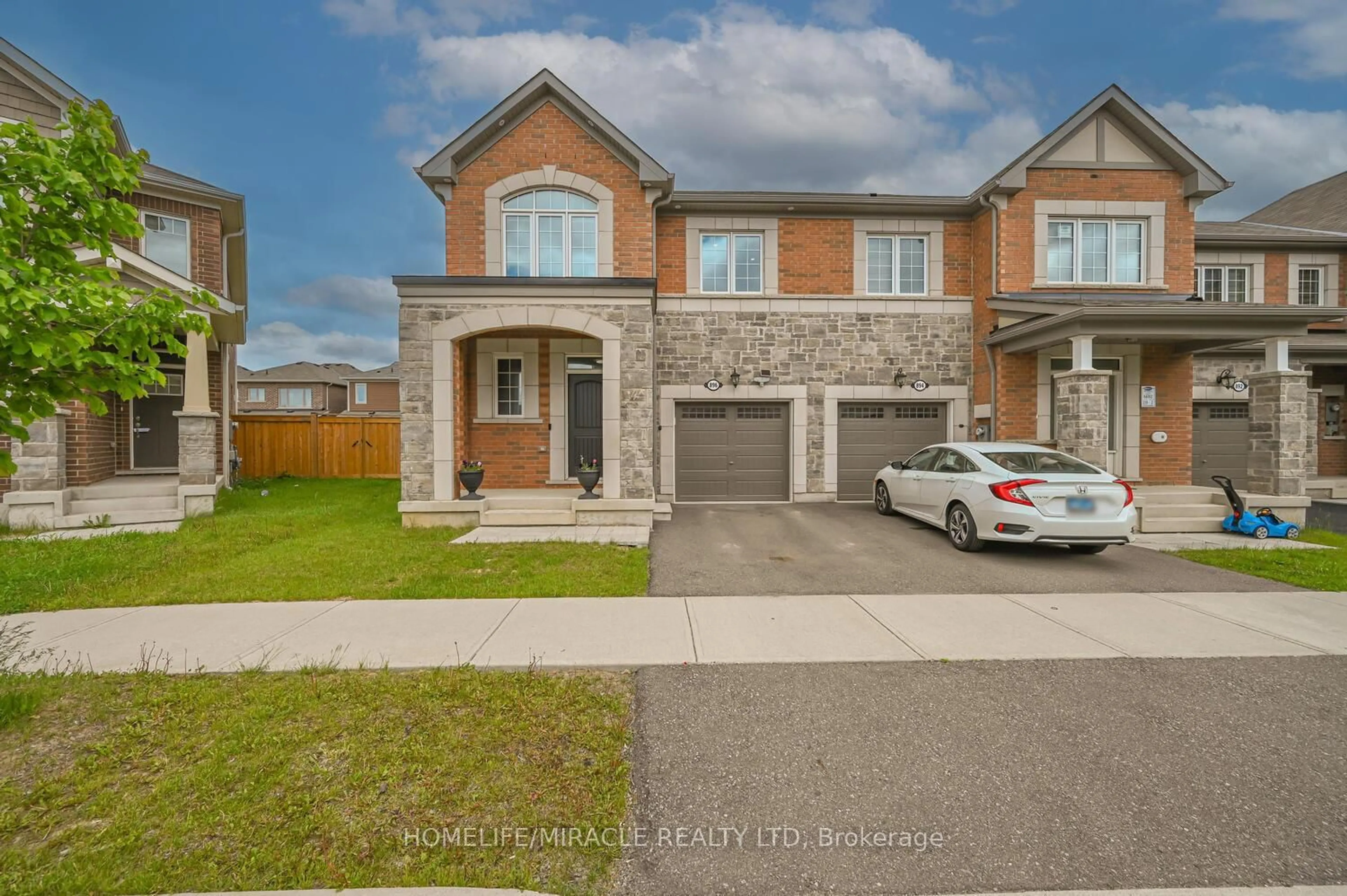 Home with brick exterior material, street for 896 Sumac Cres, Milton Ontario L9E 1R7
