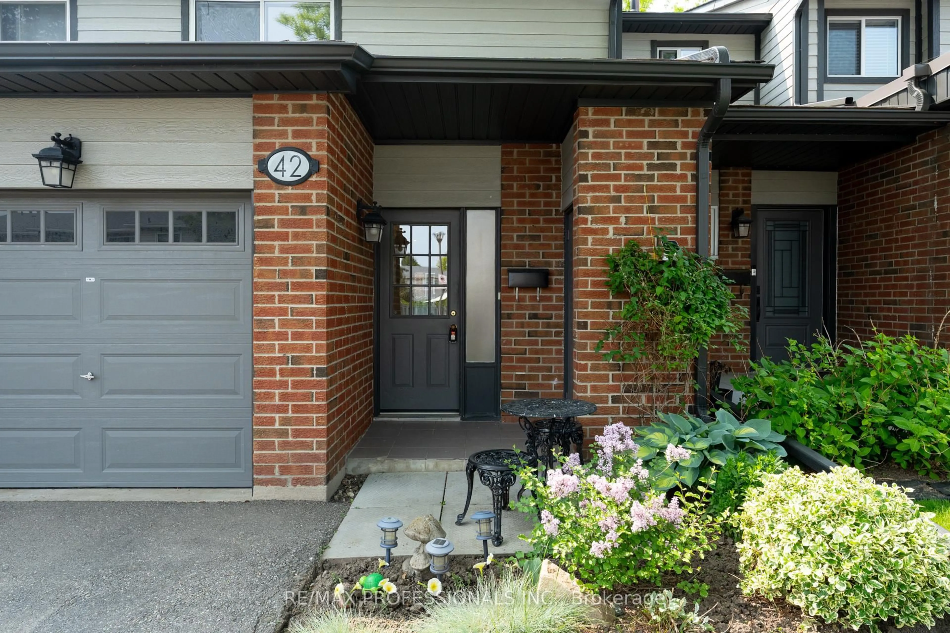 Home with brick exterior material, street for 525 Meadows Blvd #42, Mississauga Ontario L4Z 1H2