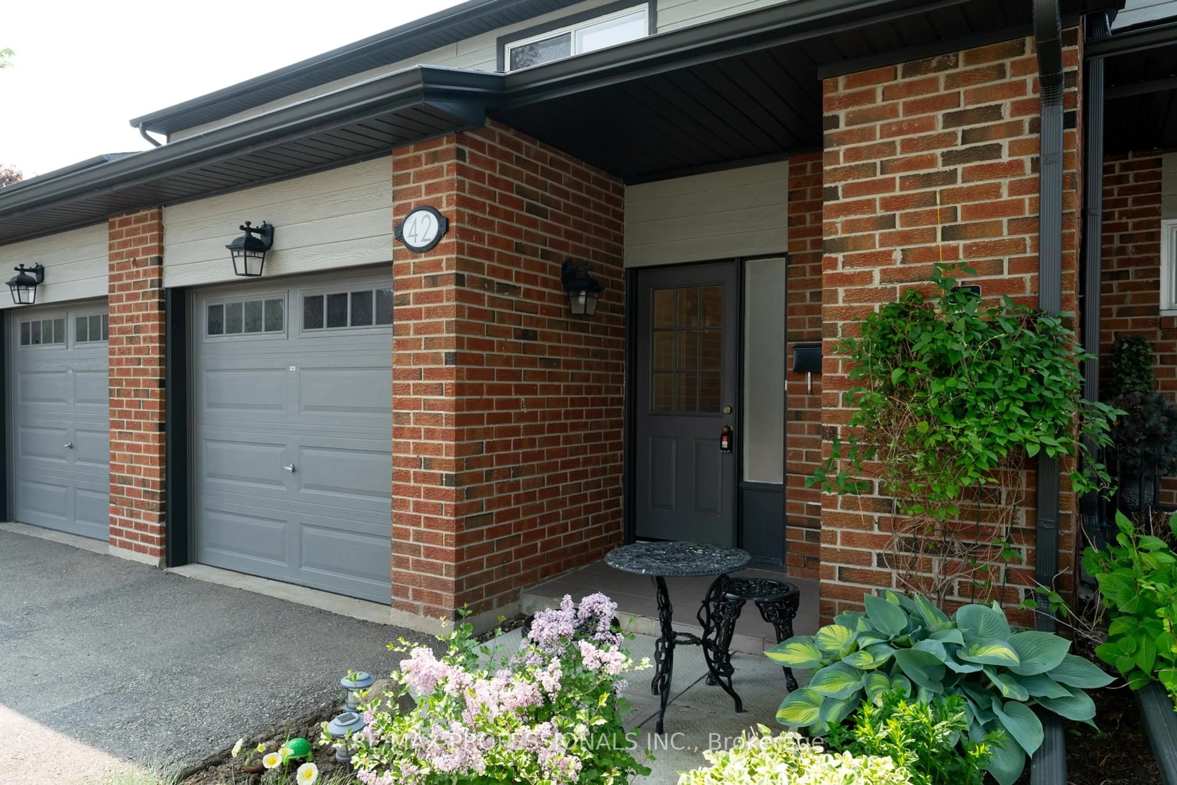Home with brick exterior material, street for 525 Meadows Blvd #42, Mississauga Ontario L4Z 1H2