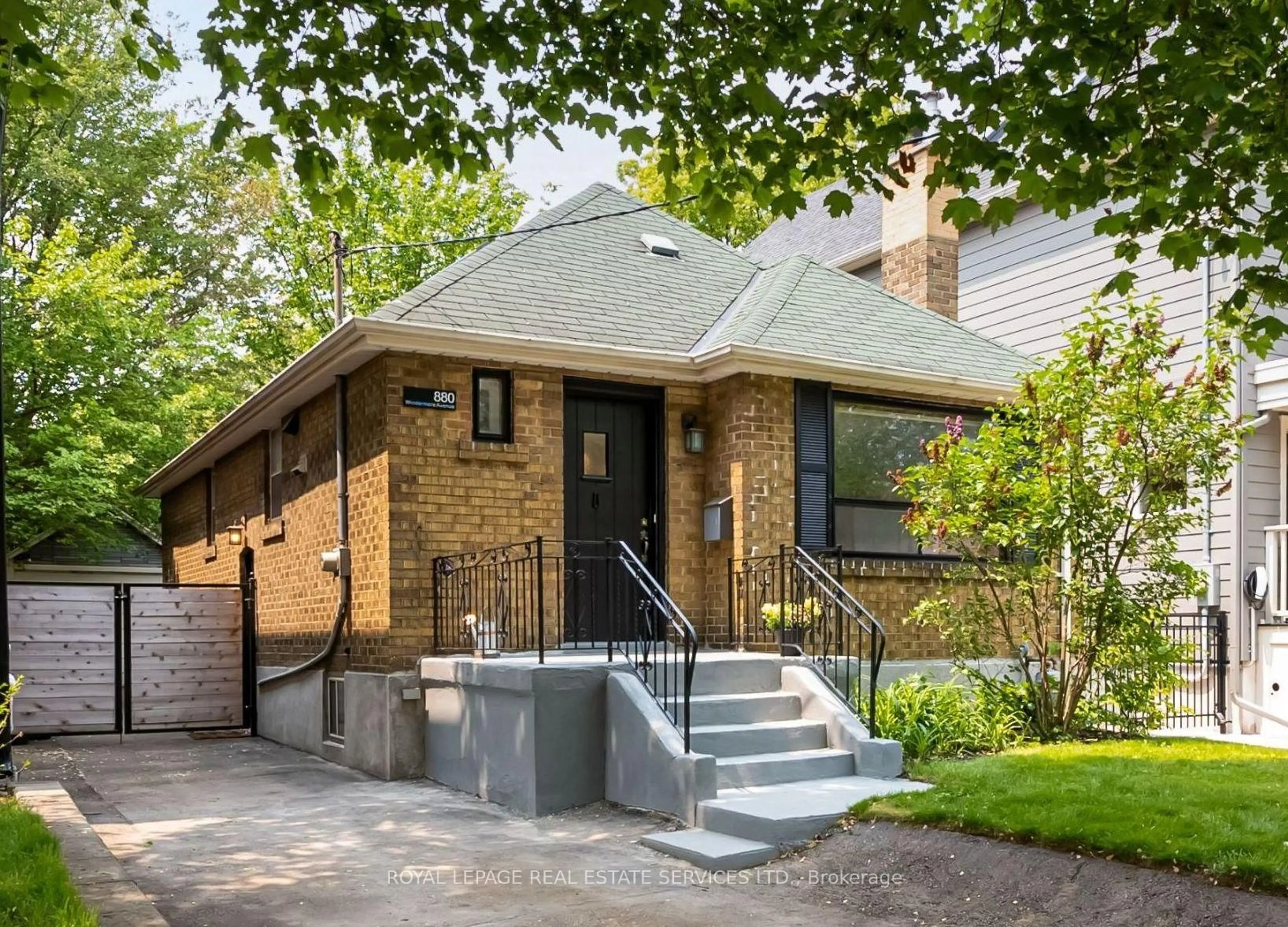Home with brick exterior material, street for 880 Windermere Ave, Toronto Ontario M6S 3M9