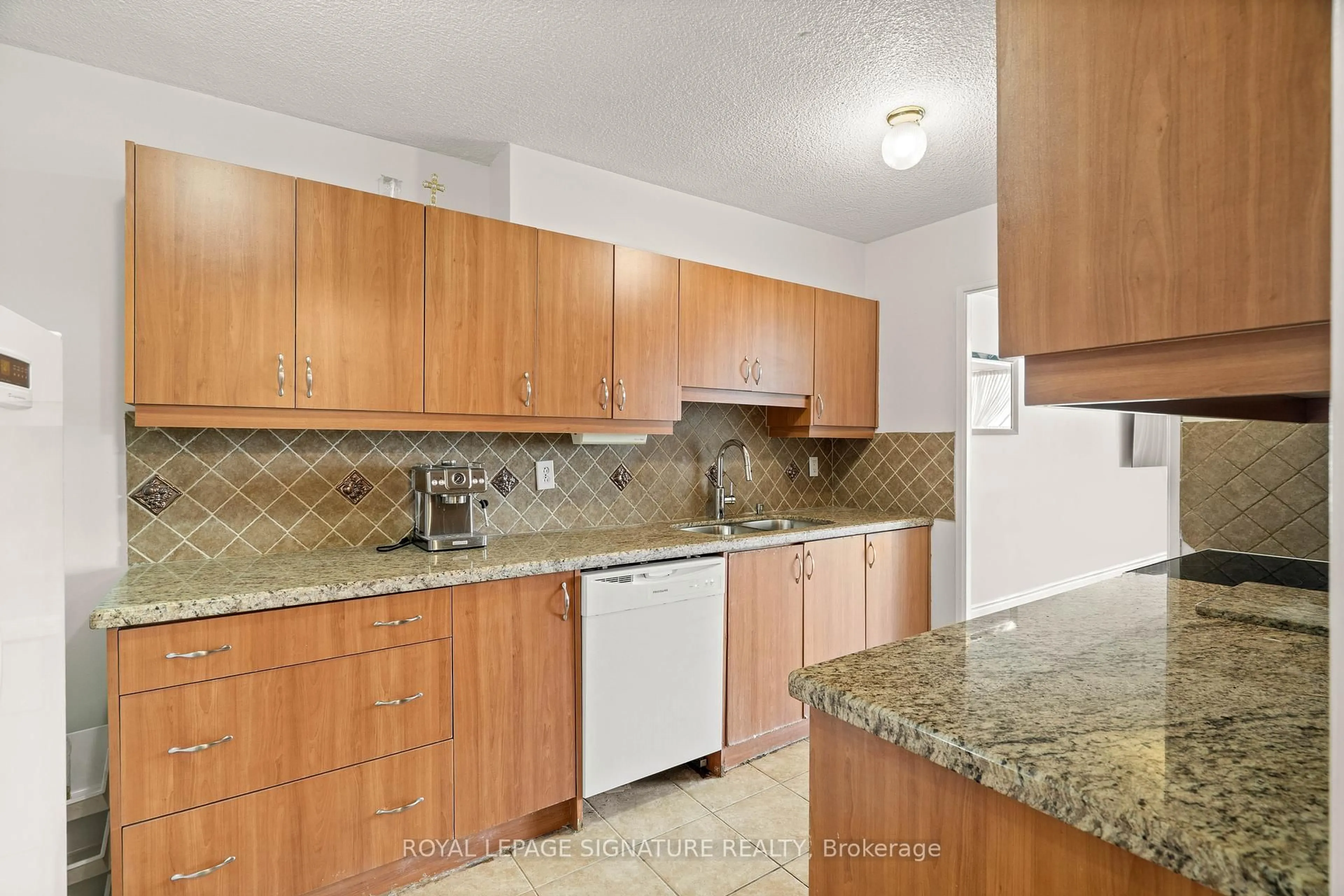 Standard kitchen, unknown for 40 Panorama Crt #1411, Toronto Ontario M9V 4M1