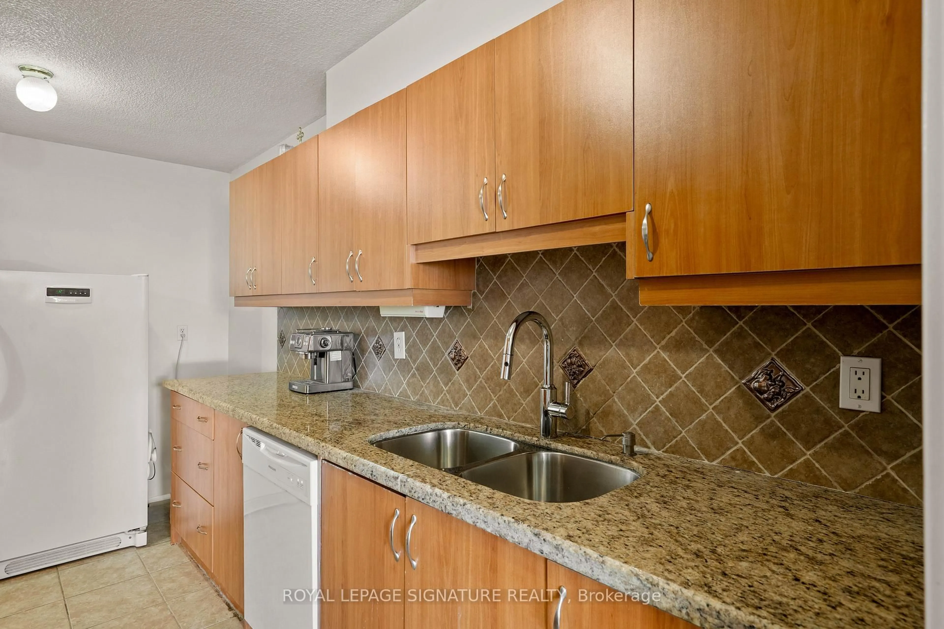 Standard kitchen, ceramic/tile floor for 40 Panorama Crt #1411, Toronto Ontario M9V 4M1