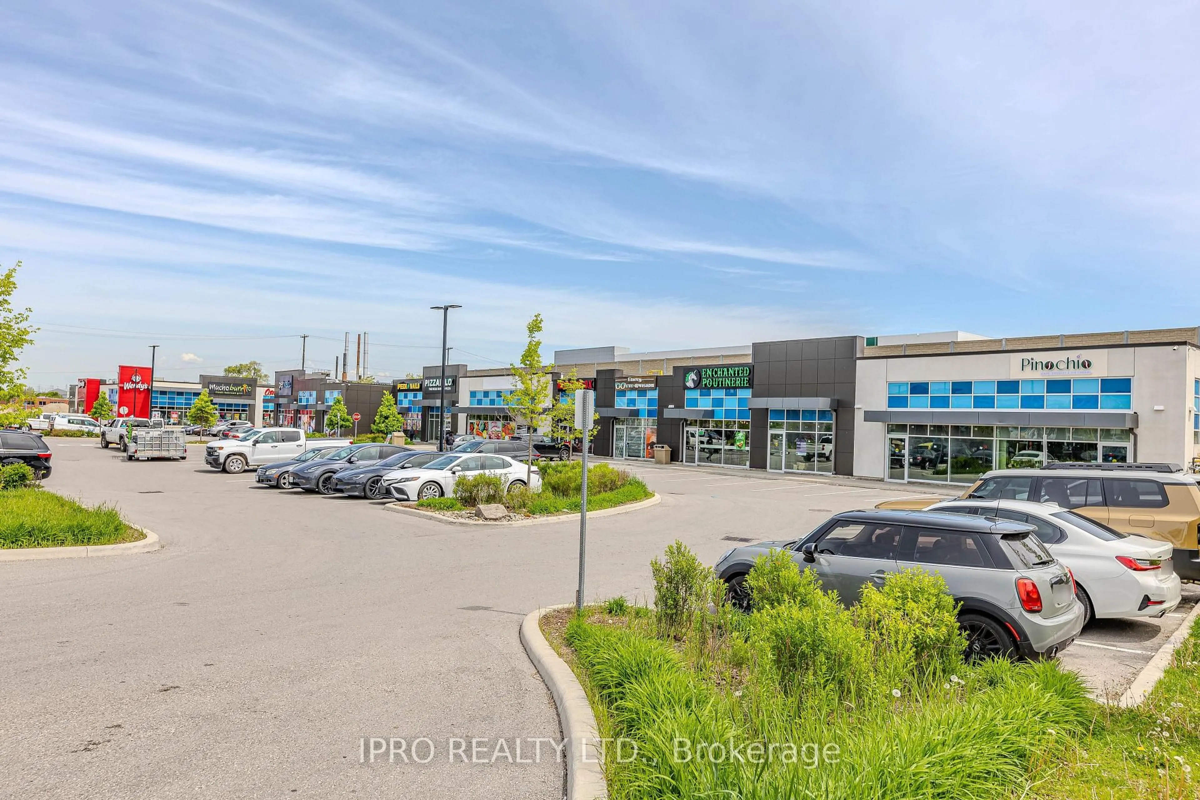 A pic from outside/outdoor area/front of a property/back of a property/a pic from drone, street for 153 Isaac Devins Blvd #2, Toronto Ontario M9M 0C5