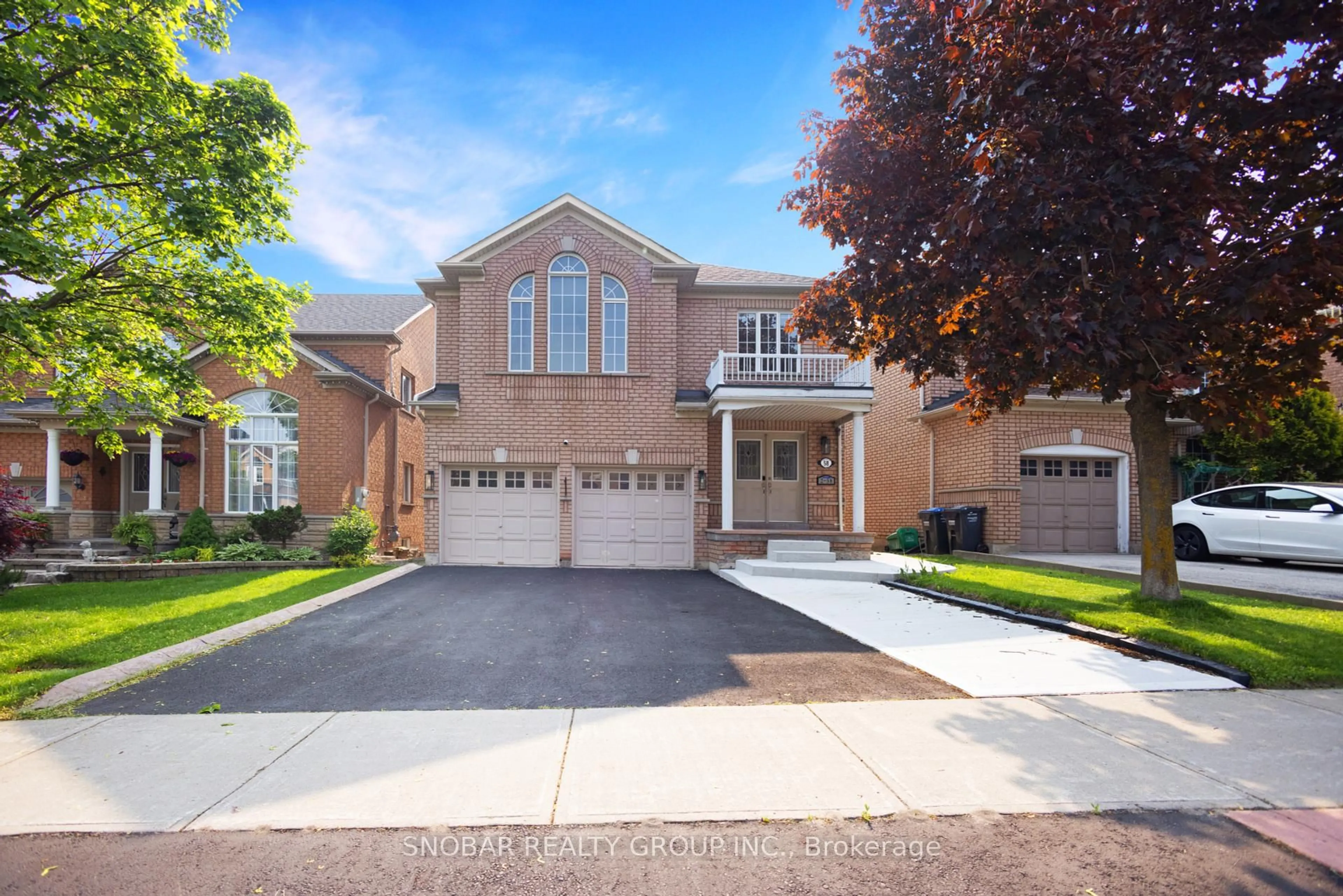 Home with brick exterior material, street for 58 Queen Mary Dr, Brampton Ontario L7A 2K3