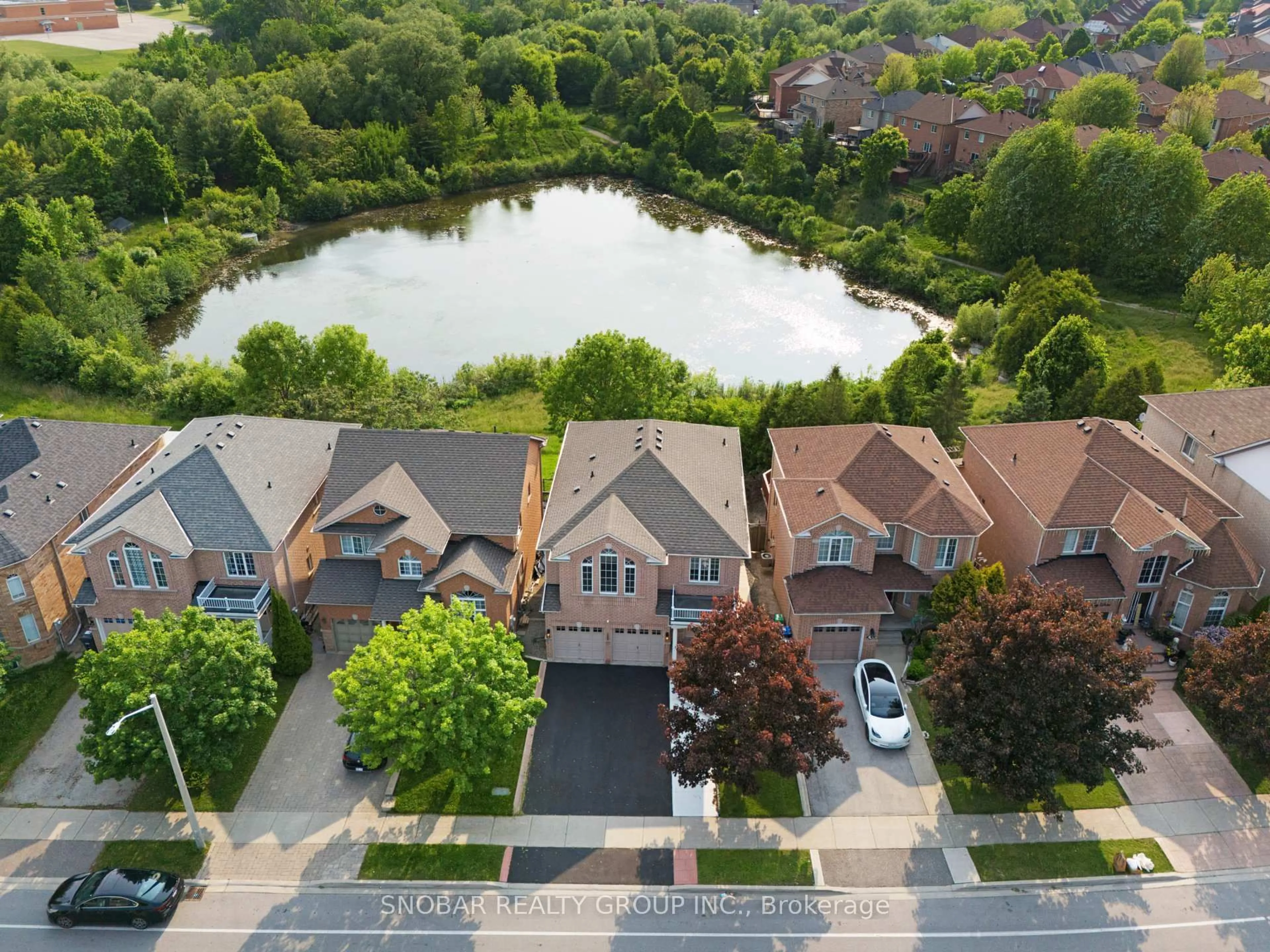 A pic from outside/outdoor area/front of a property/back of a property/a pic from drone, water/lake/river/ocean view for 58 Queen Mary Dr, Brampton Ontario L7A 2K3