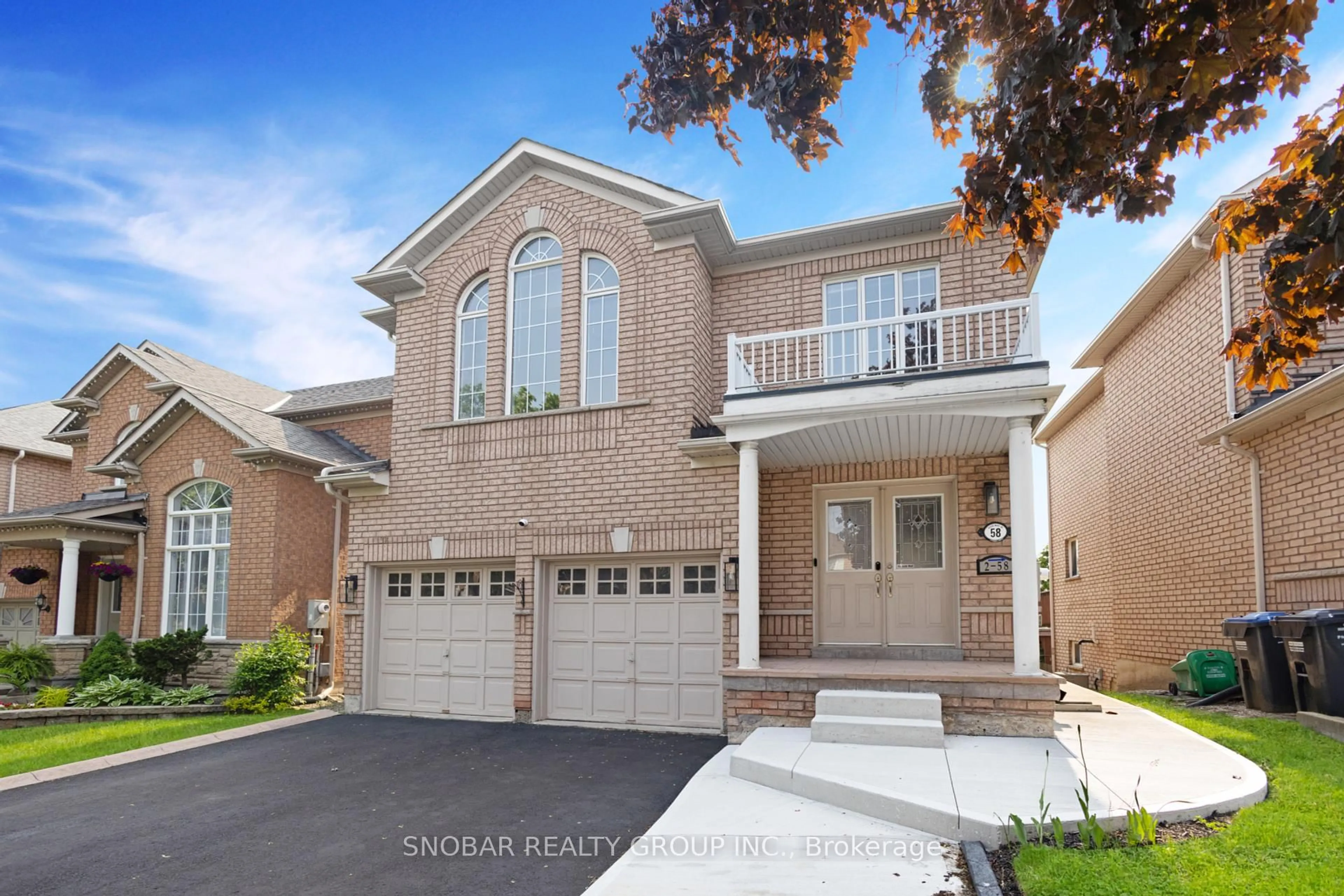 Home with brick exterior material, street for 58 Queen Mary Dr, Brampton Ontario L7A 2K3