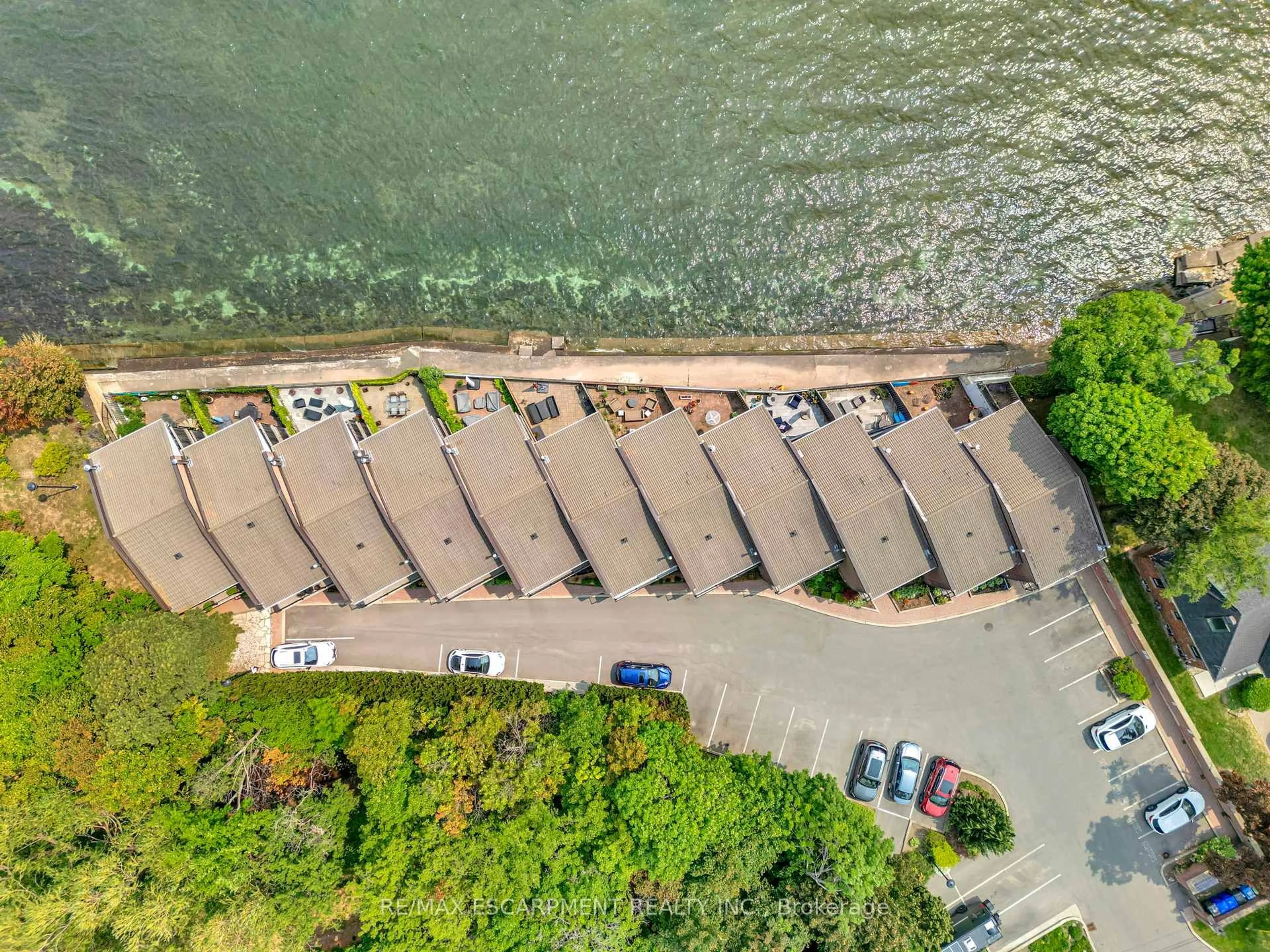 A pic from outside/outdoor area/front of a property/back of a property/a pic from drone, water/lake/river/ocean view for 2136 Old Lakeshore Rd #3, Burlington Ontario L7R 1A3