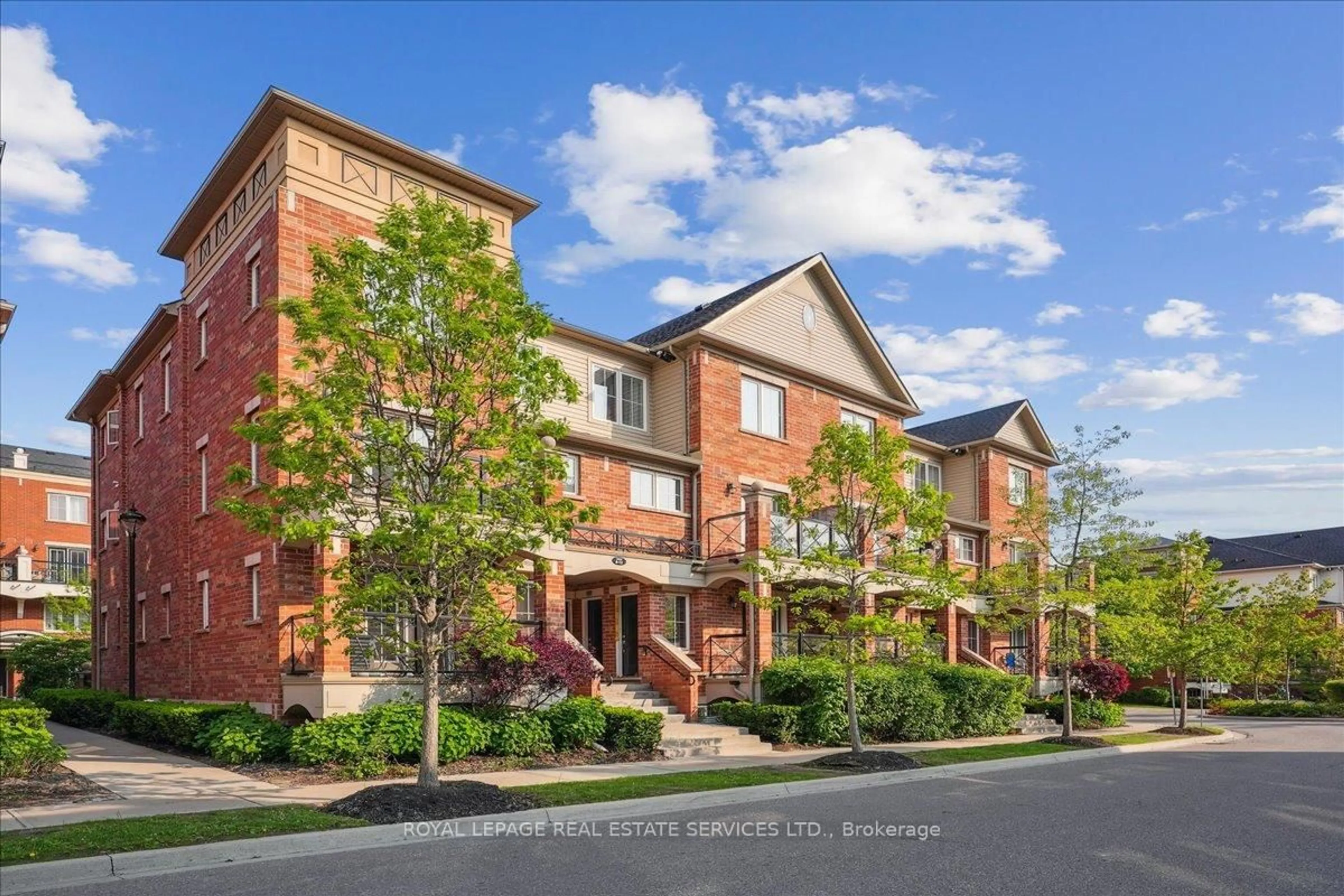 Home with brick exterior material, street for 2464 POST Rd #9, Oakville Ontario L6H 0J2