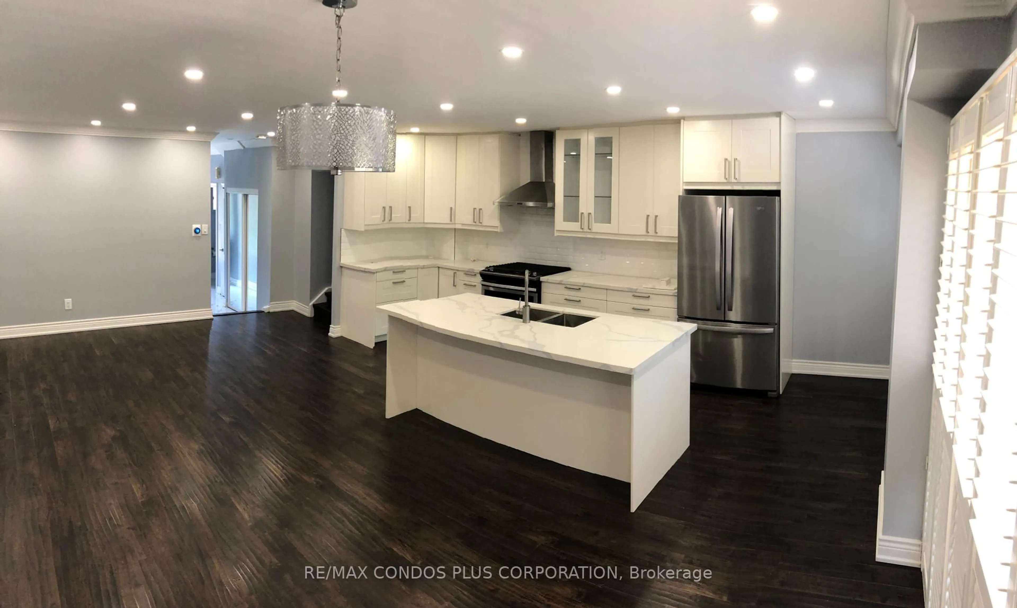 Open concept kitchen, wood/laminate floor for 525 Meadows Blvd #31, Mississauga Ontario L4Z 1H2