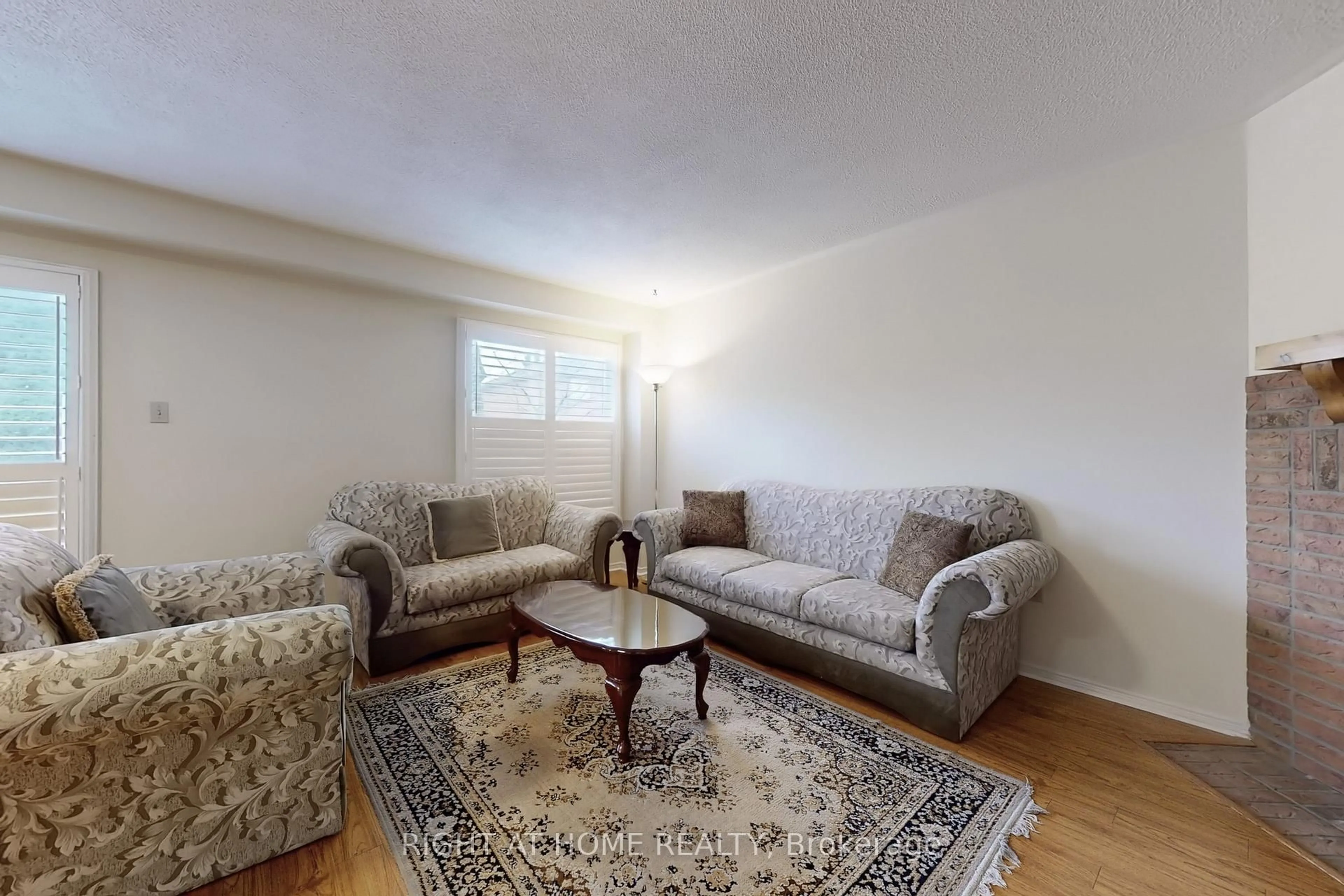 Living room with furniture, unknown for 23 Duggan Dr, Brampton Ontario L6Y 4H9
