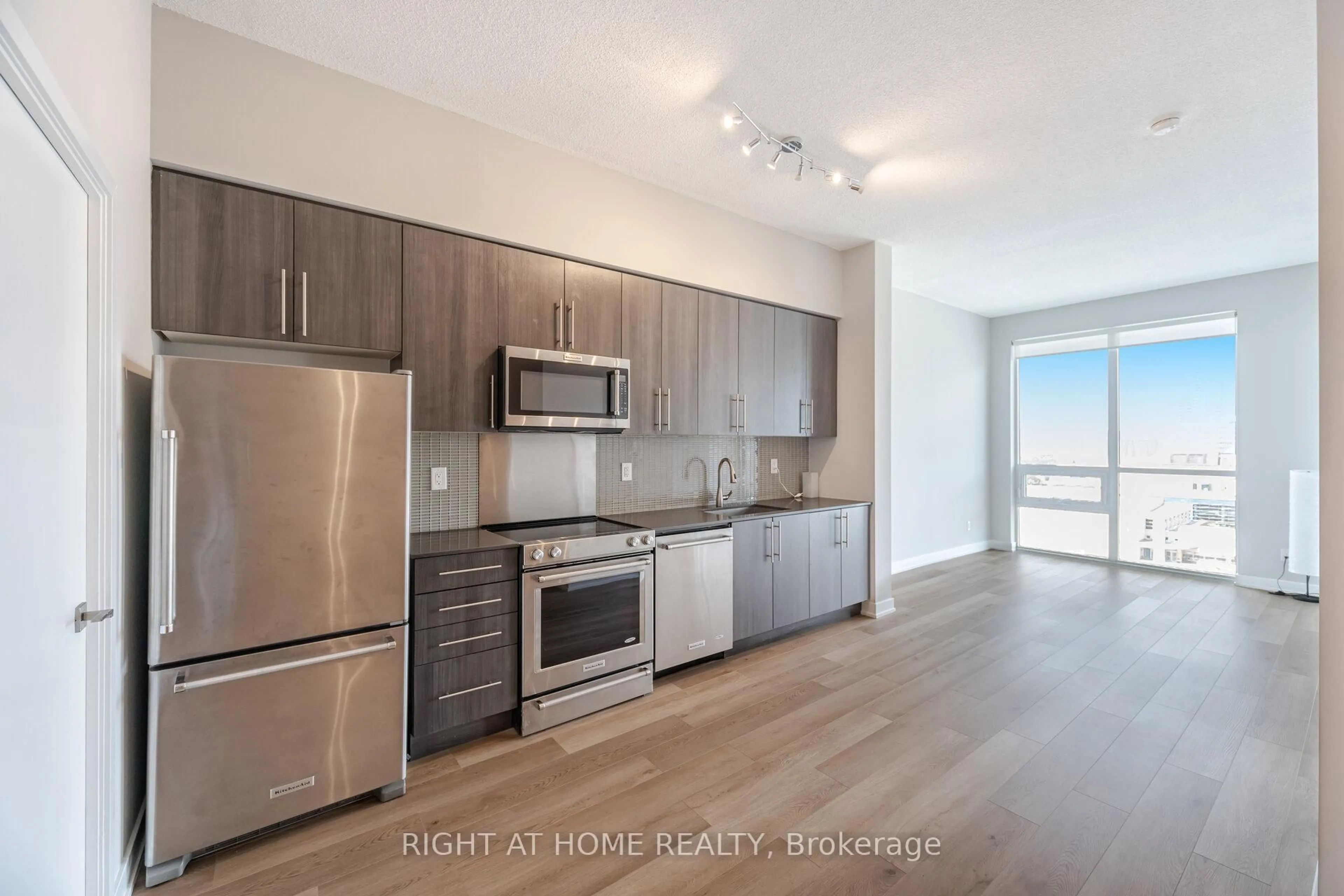 Open concept kitchen, unknown for 4011 Brickstone Mews #715, Mississauga Ontario L5B 0J7