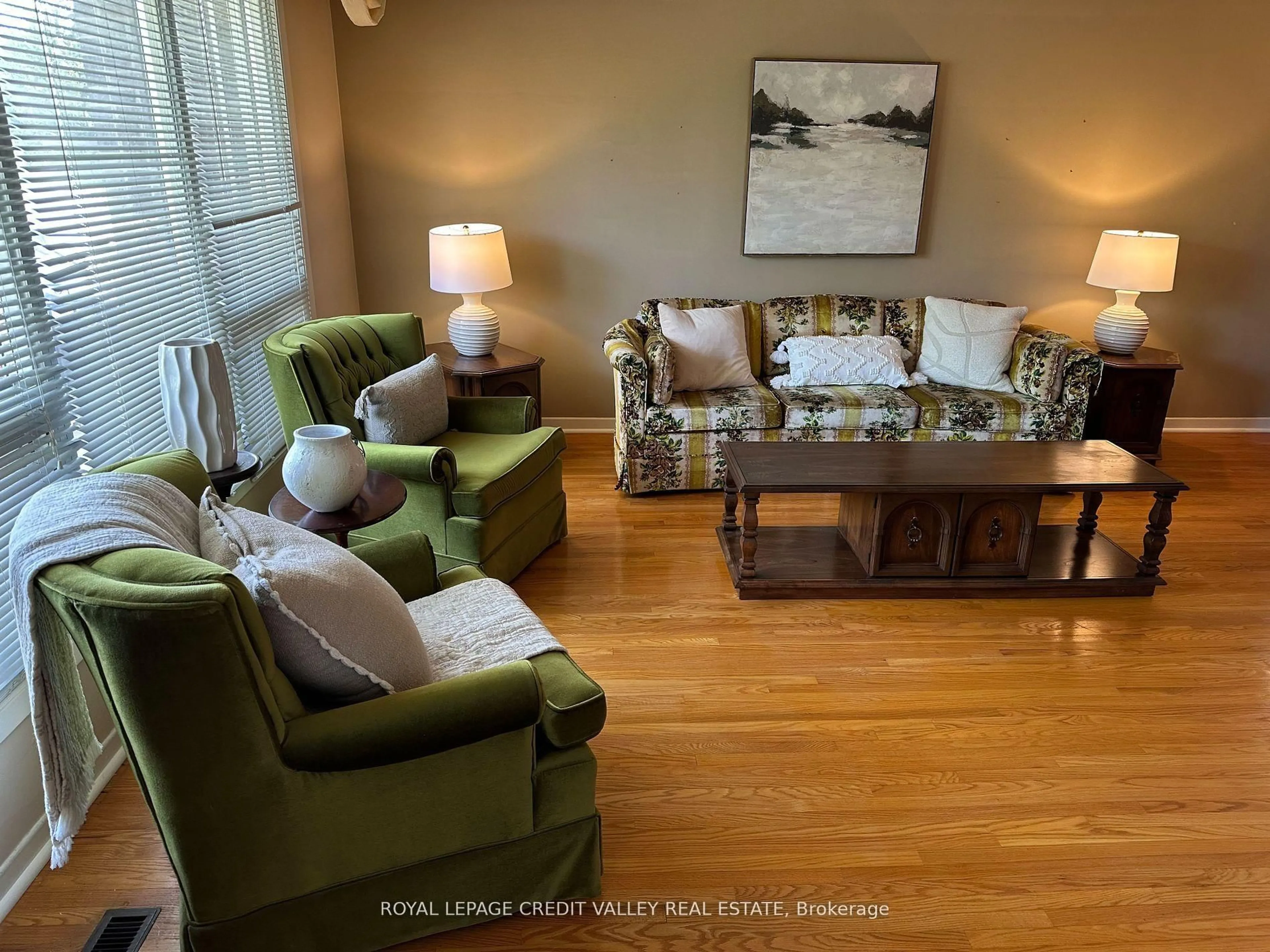 Living room with furniture, wood/laminate floor for 82 Terra Cotta Cres, Brampton Ontario L6W 1C1