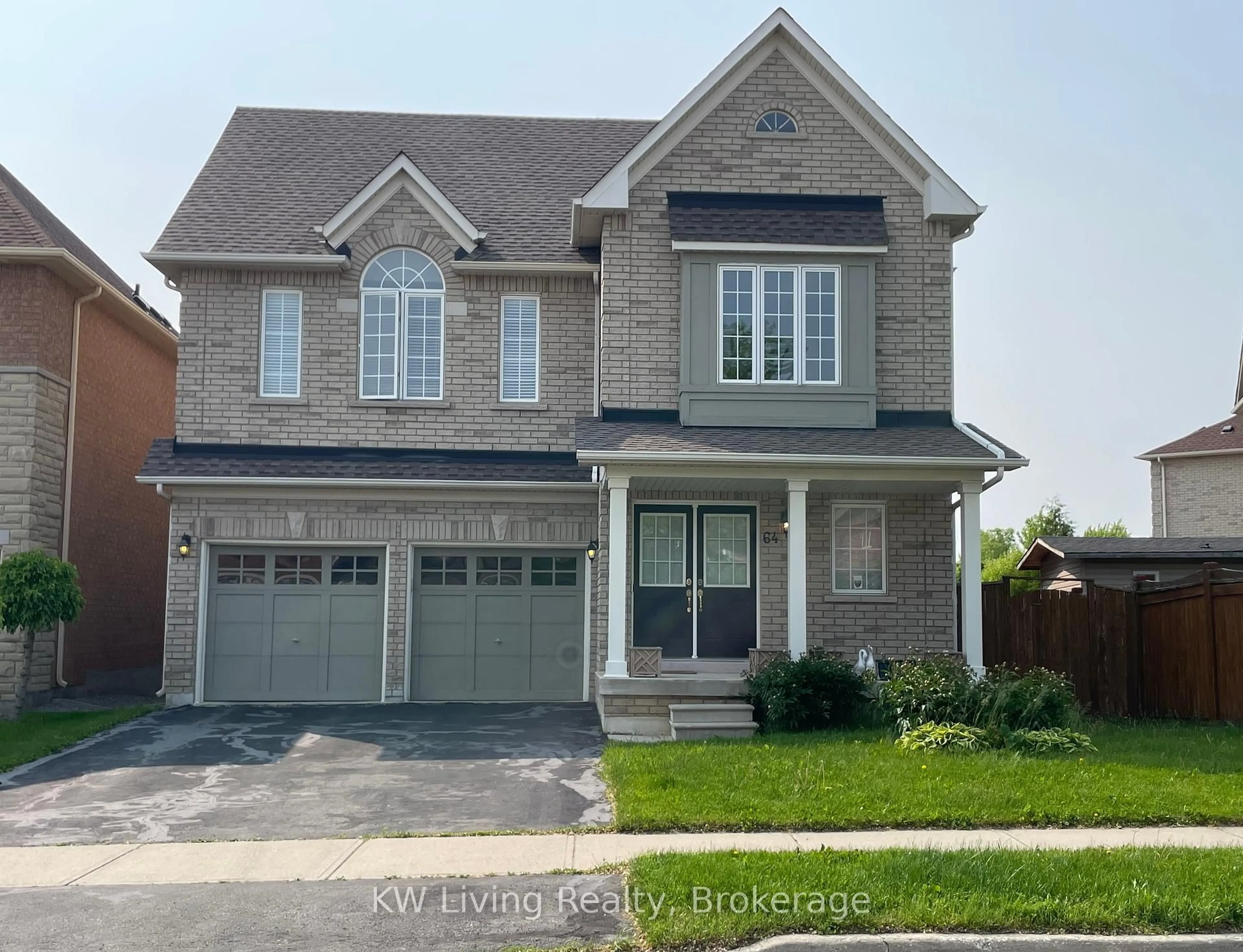 Home with brick exterior material, street for 64 Oblate Cres, Brampton Ontario L6Y 0L4
