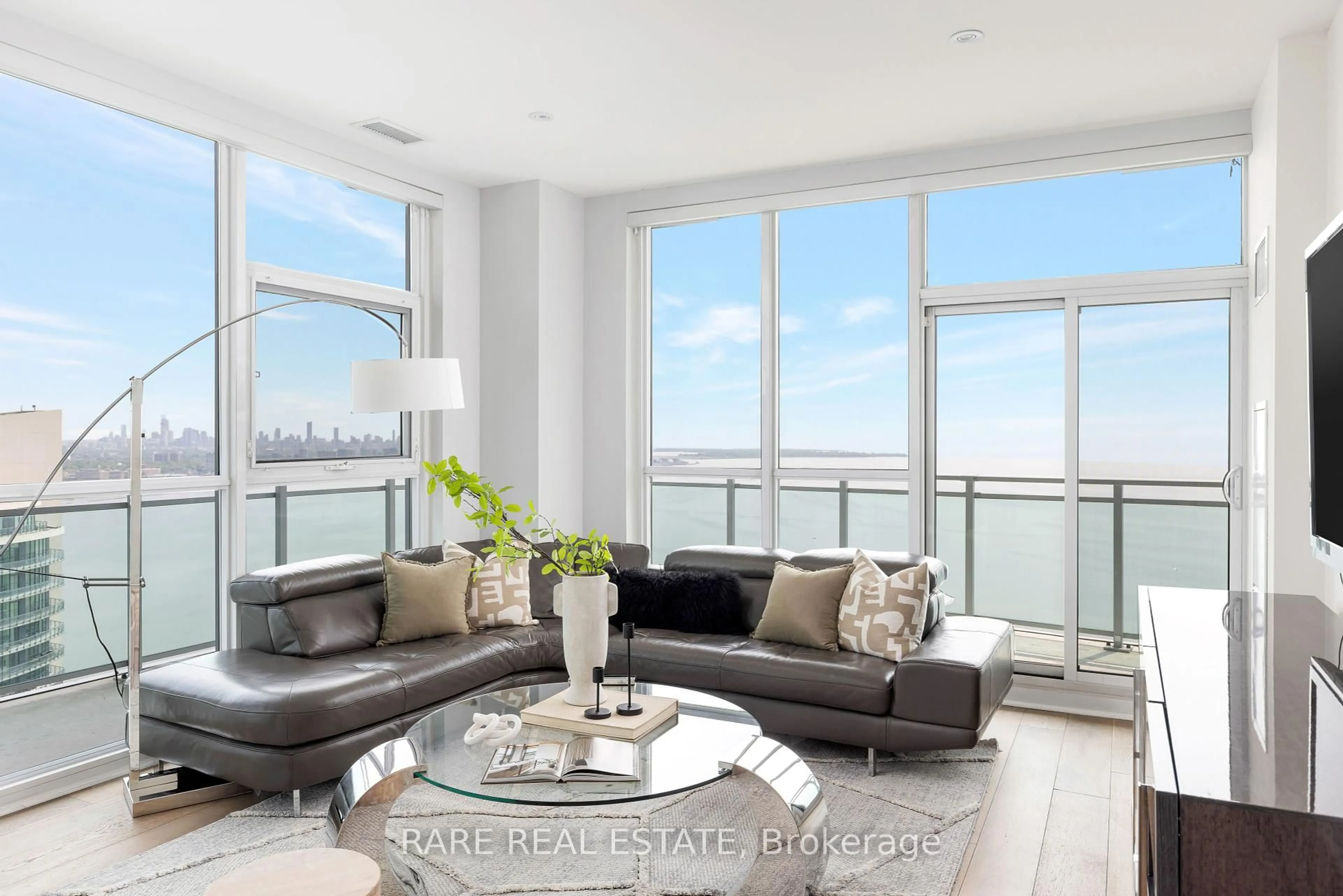 Living room with furniture, unknown for 33 Shore Breeze Dr #UPH4103, Toronto Ontario M8V 0G1