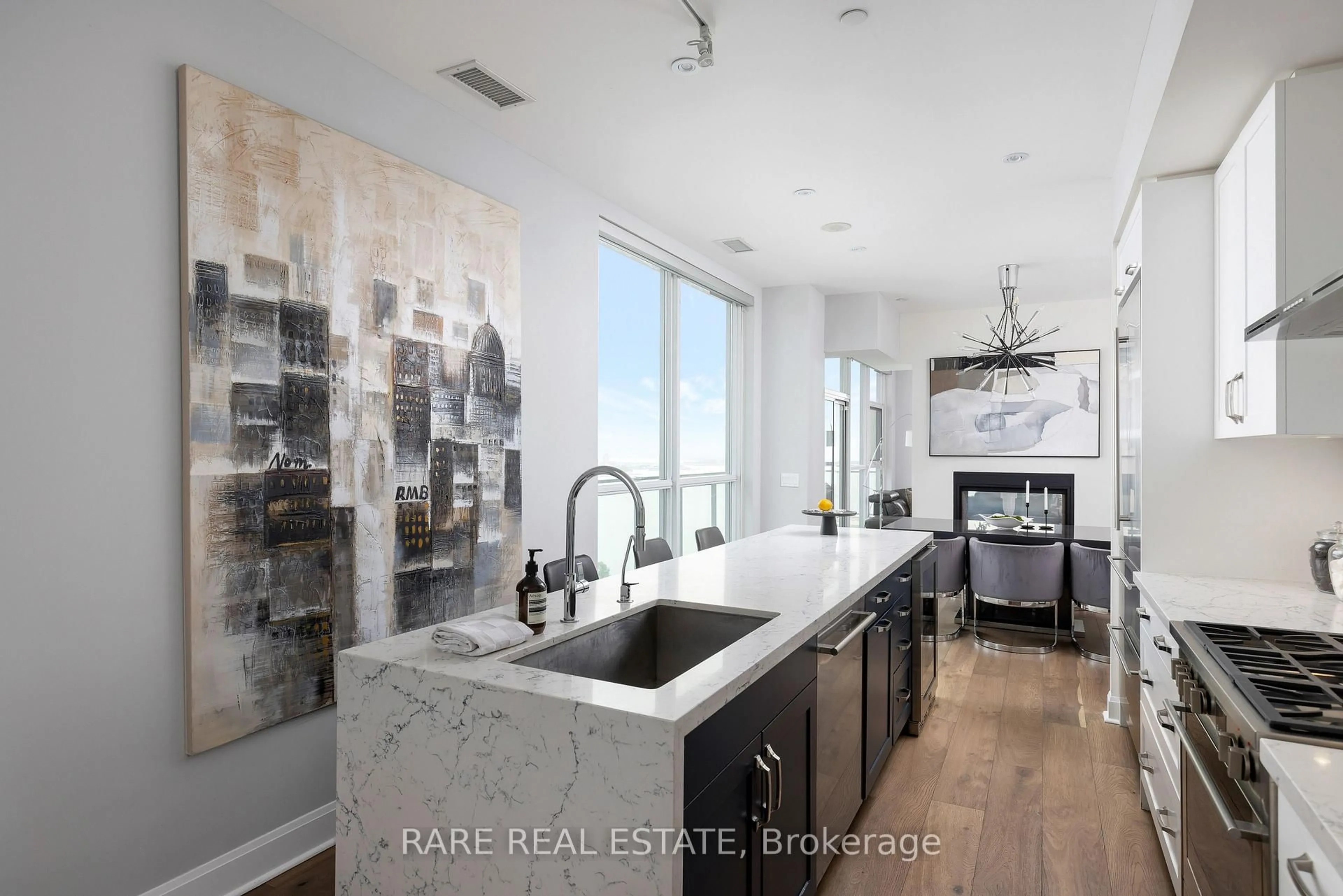 Open concept kitchen, ceramic/tile floor for 33 Shore Breeze Dr #UPH4103, Toronto Ontario M8V 0G1