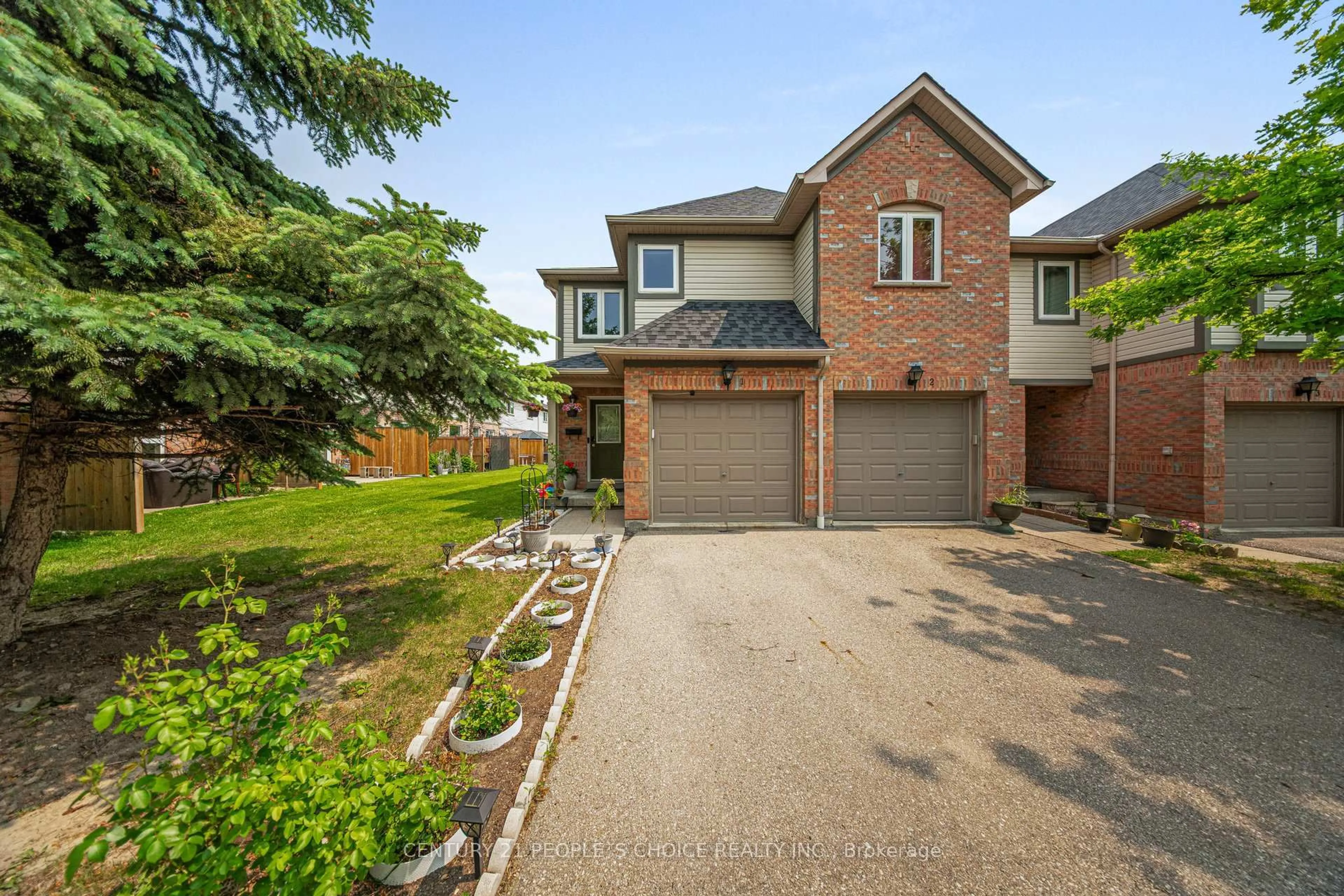 Home with brick exterior material, street for 5255 Guildwood Way #1, Mississauga Ontario L5R 4A6