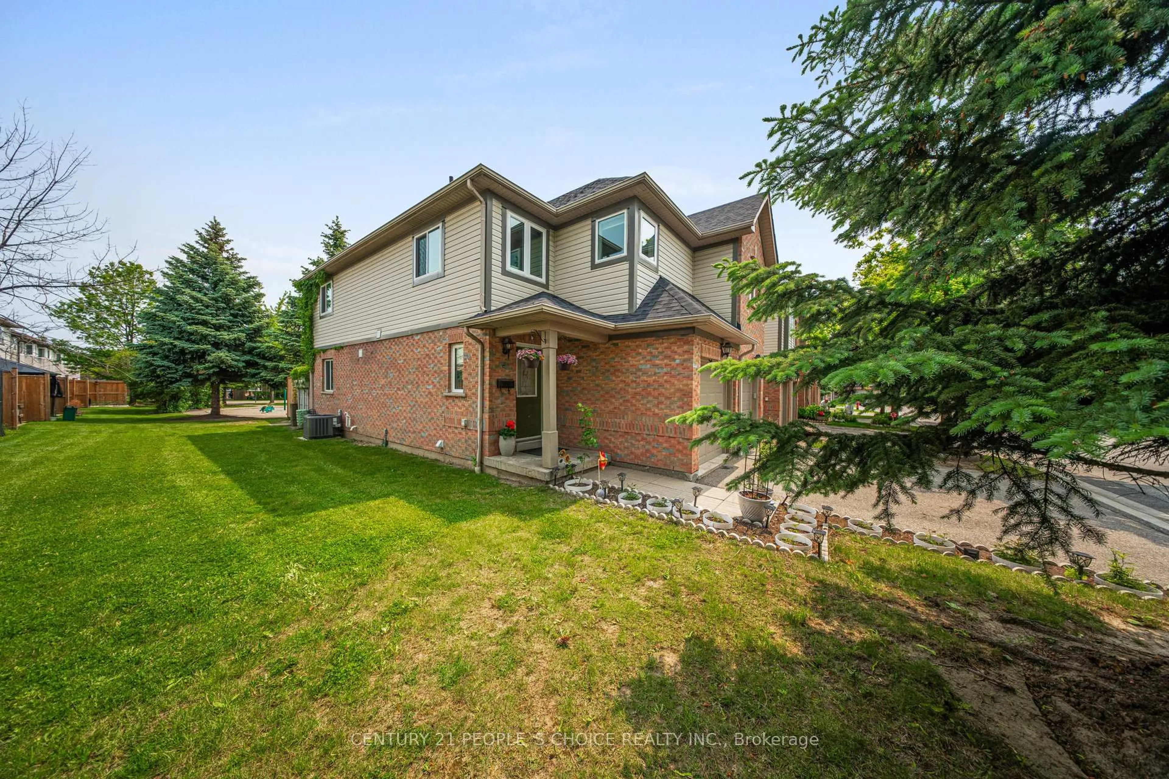 Home with brick exterior material, street for 5255 Guildwood Way #1, Mississauga Ontario L5R 4A6