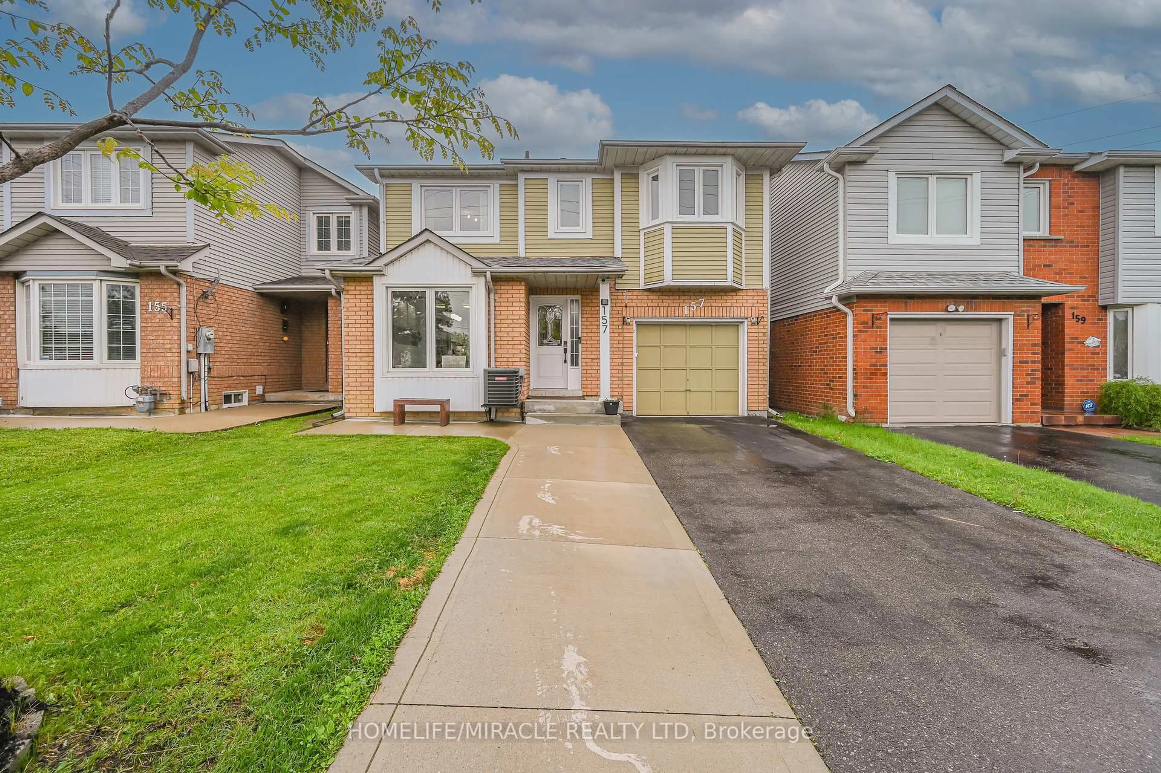 Home with brick exterior material, street for 157 Millstone Dr, Brampton Ontario L6Y 4P9