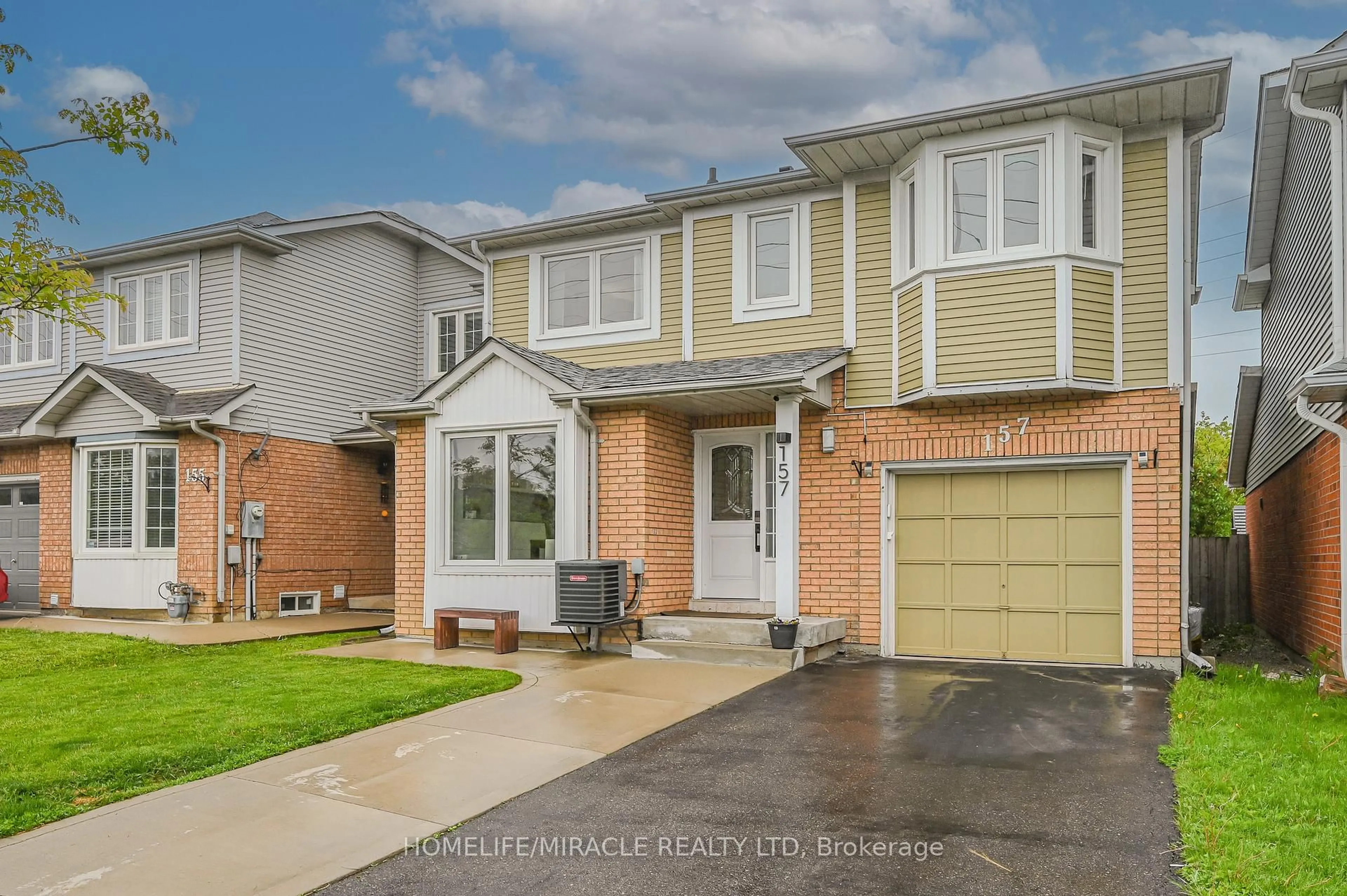 Home with brick exterior material, street for 157 Millstone Dr, Brampton Ontario L6Y 4P9