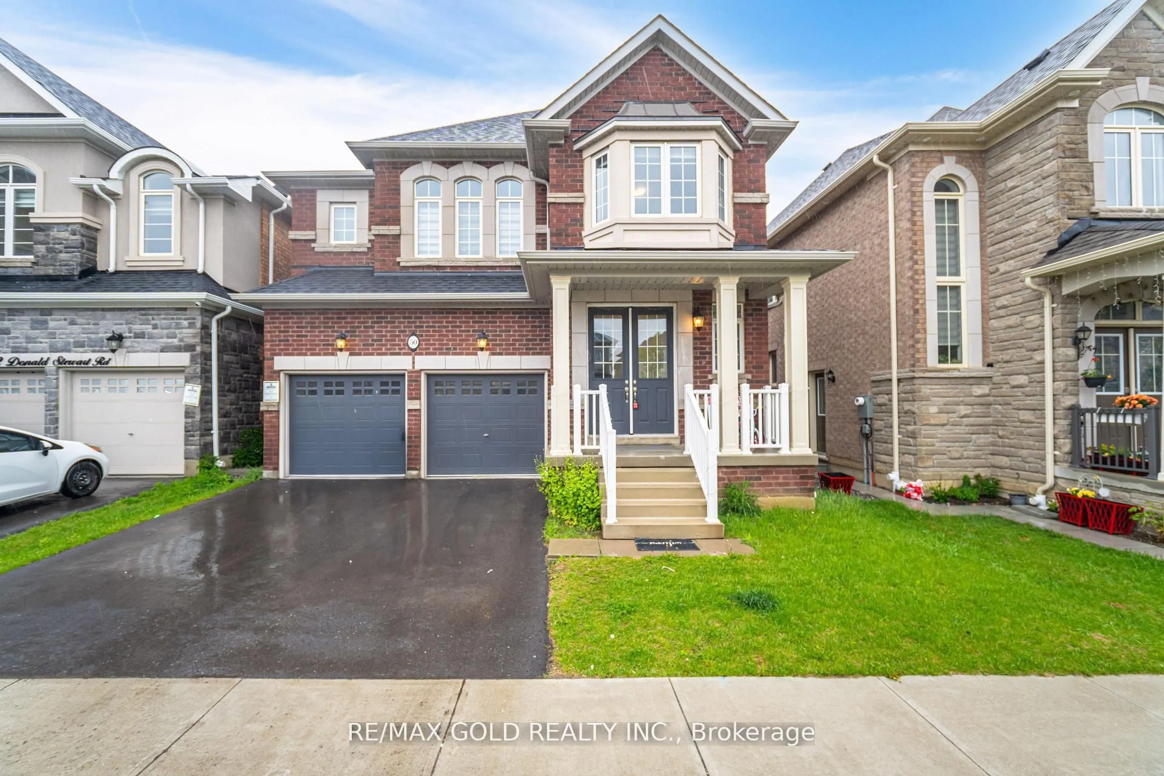 Home with brick exterior material, street for 50 Donald Stewart Rd, Brampton Ontario L7A 5J1