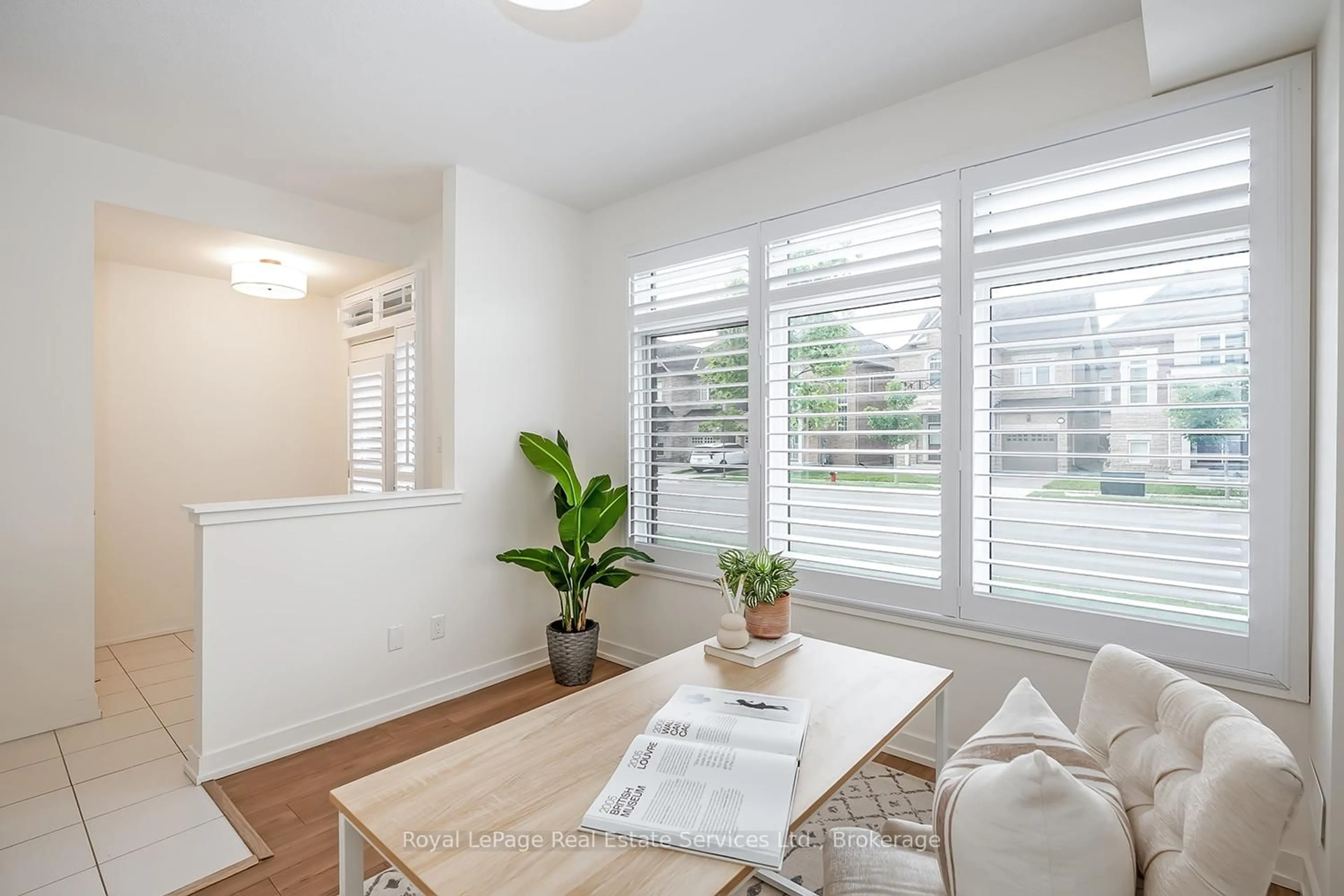 Living room with furniture, wood/laminate floor for 3177 Ernest Appelbe Blvd, Oakville Ontario L6H 0P1